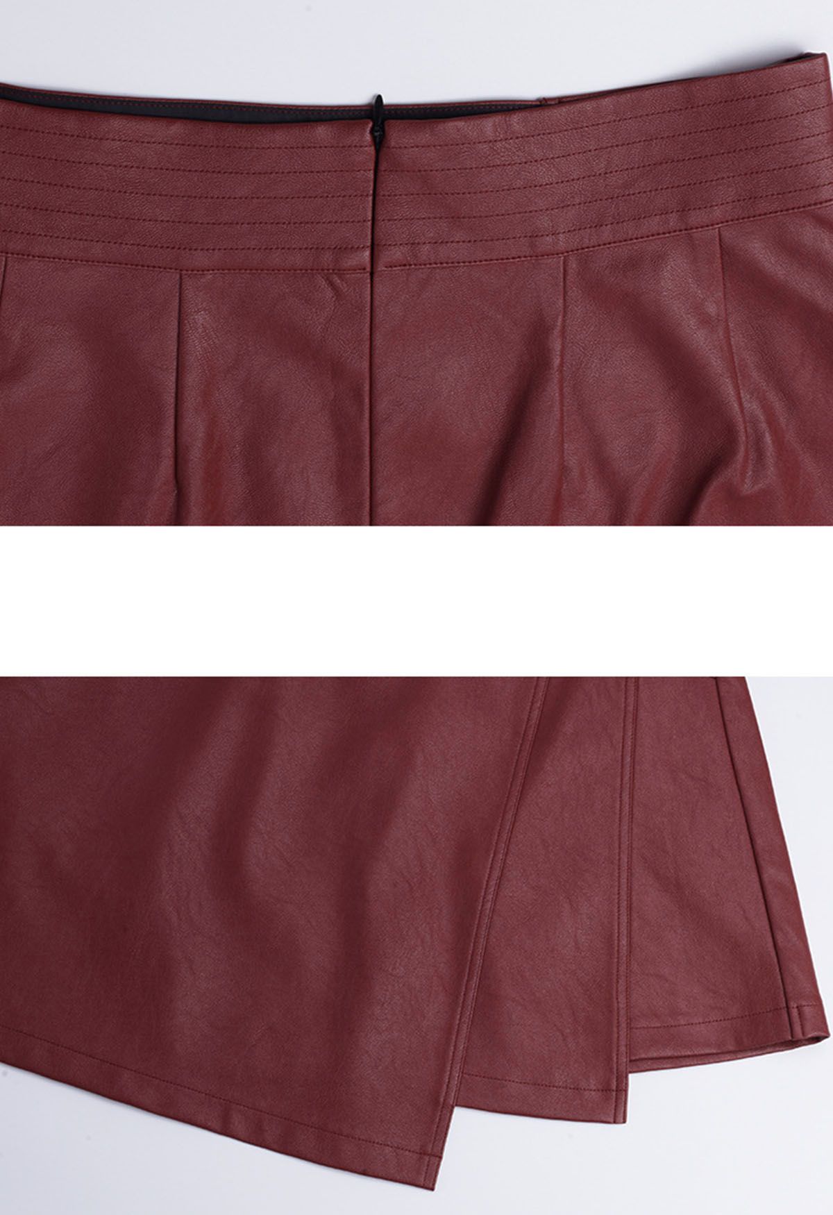 Mini-jupe en similicuir à ourlet irrégulier en rouge