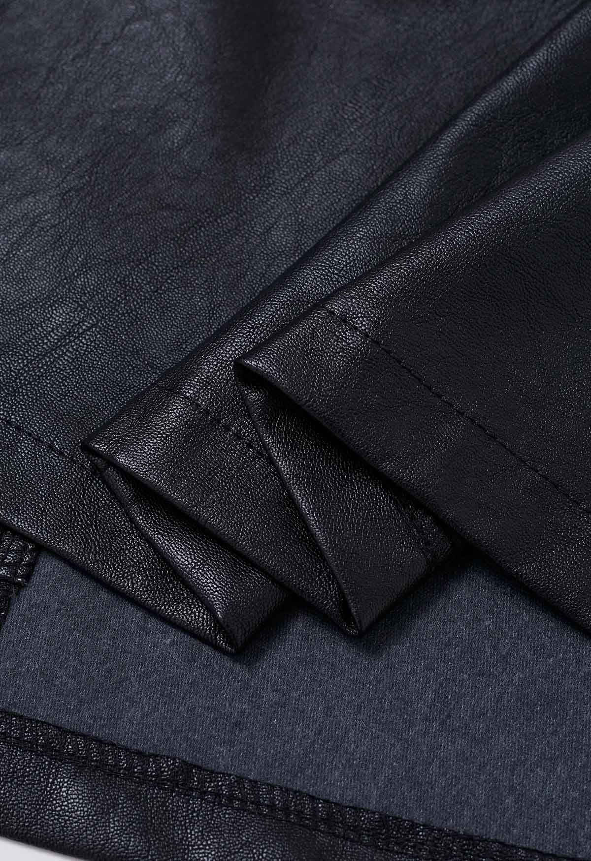 Mini-jupe en similicuir à ourlet irrégulier en noir