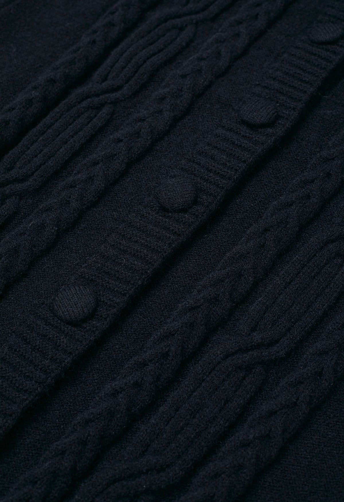 Cardigan long boutonné en tricot torsadé avec col en fausse fourrure en noir