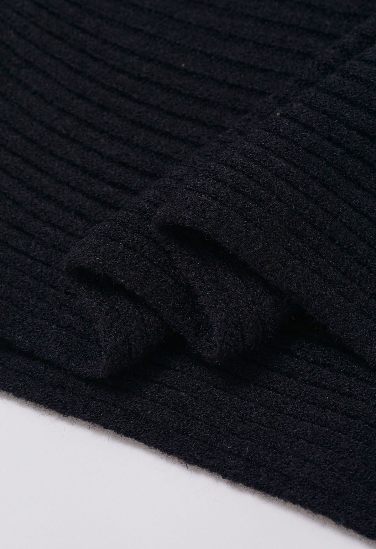 Pull en tricot côtelé à manches chauve-souris dramatique en noir