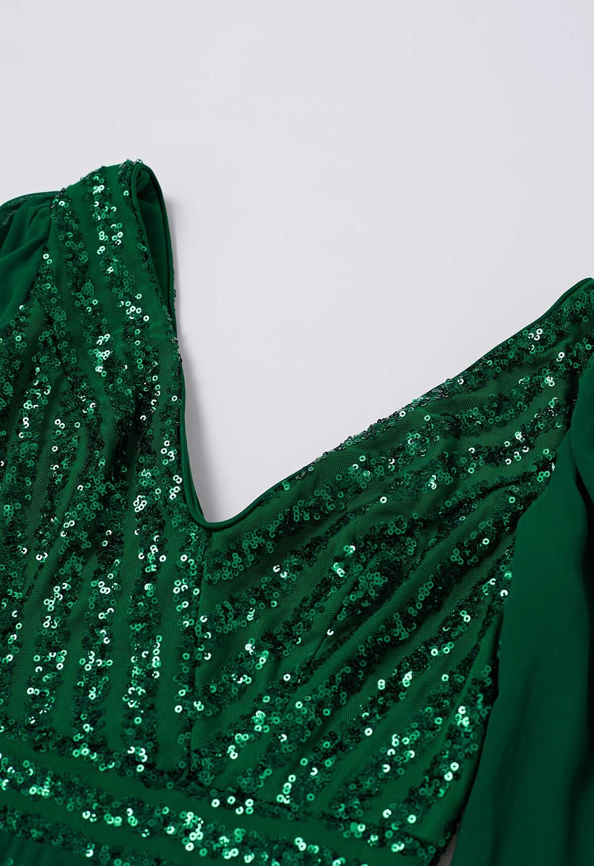 Robe à sequins et col en V à nouer aux poignets