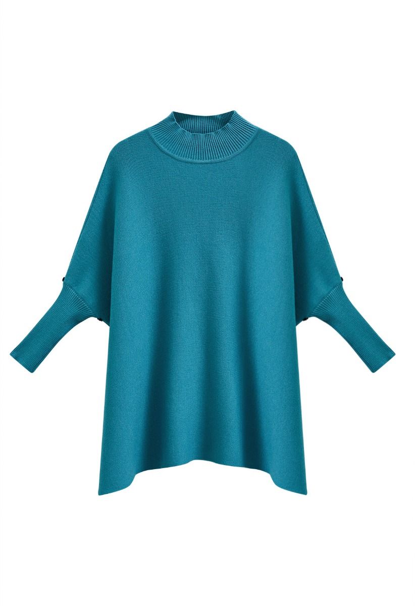 Poncho en tricot à ourlet fendu et manches en fausse fourrure en turquoise