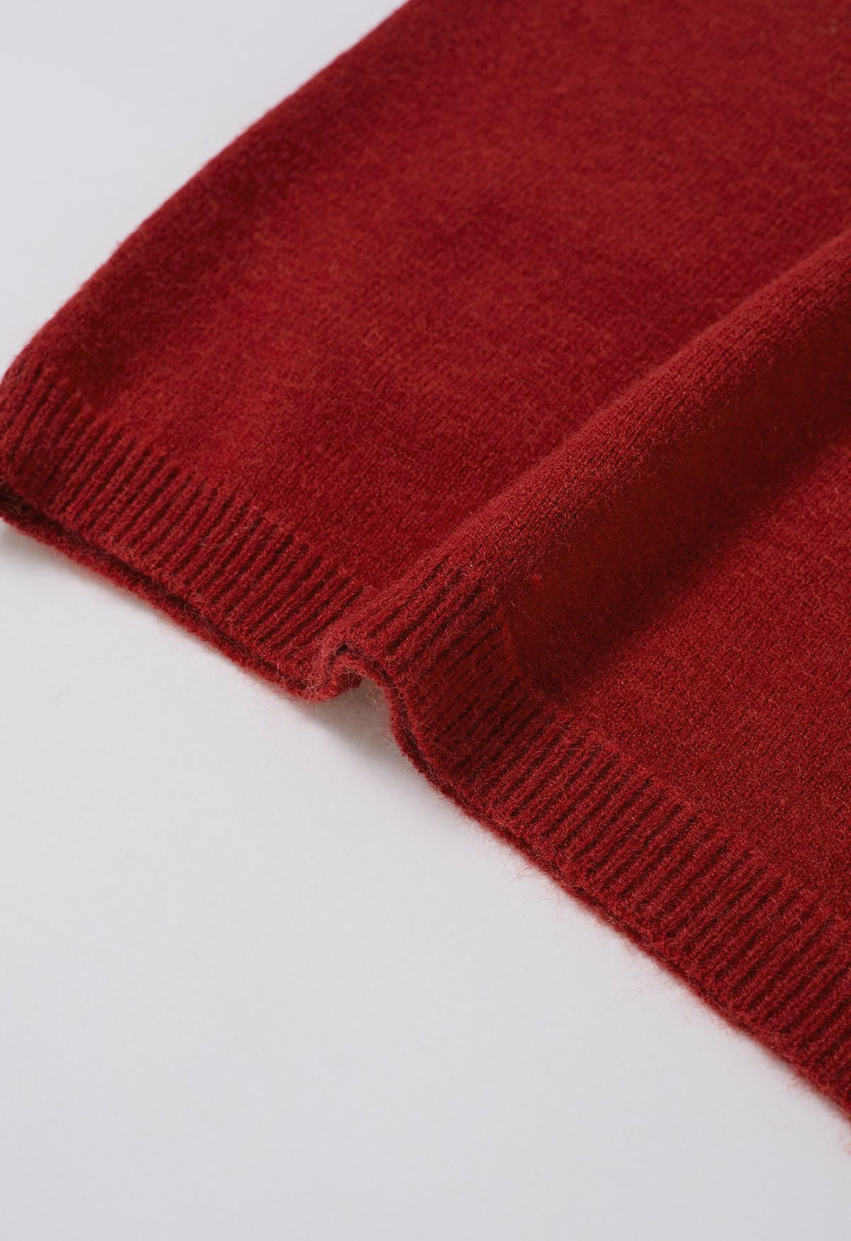 Pull en tricot à épaules dénudées et nœud papillon en rouge