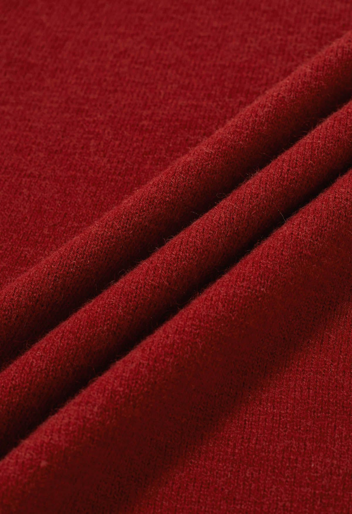 Pull en tricot à épaules dénudées et nœud papillon en rouge