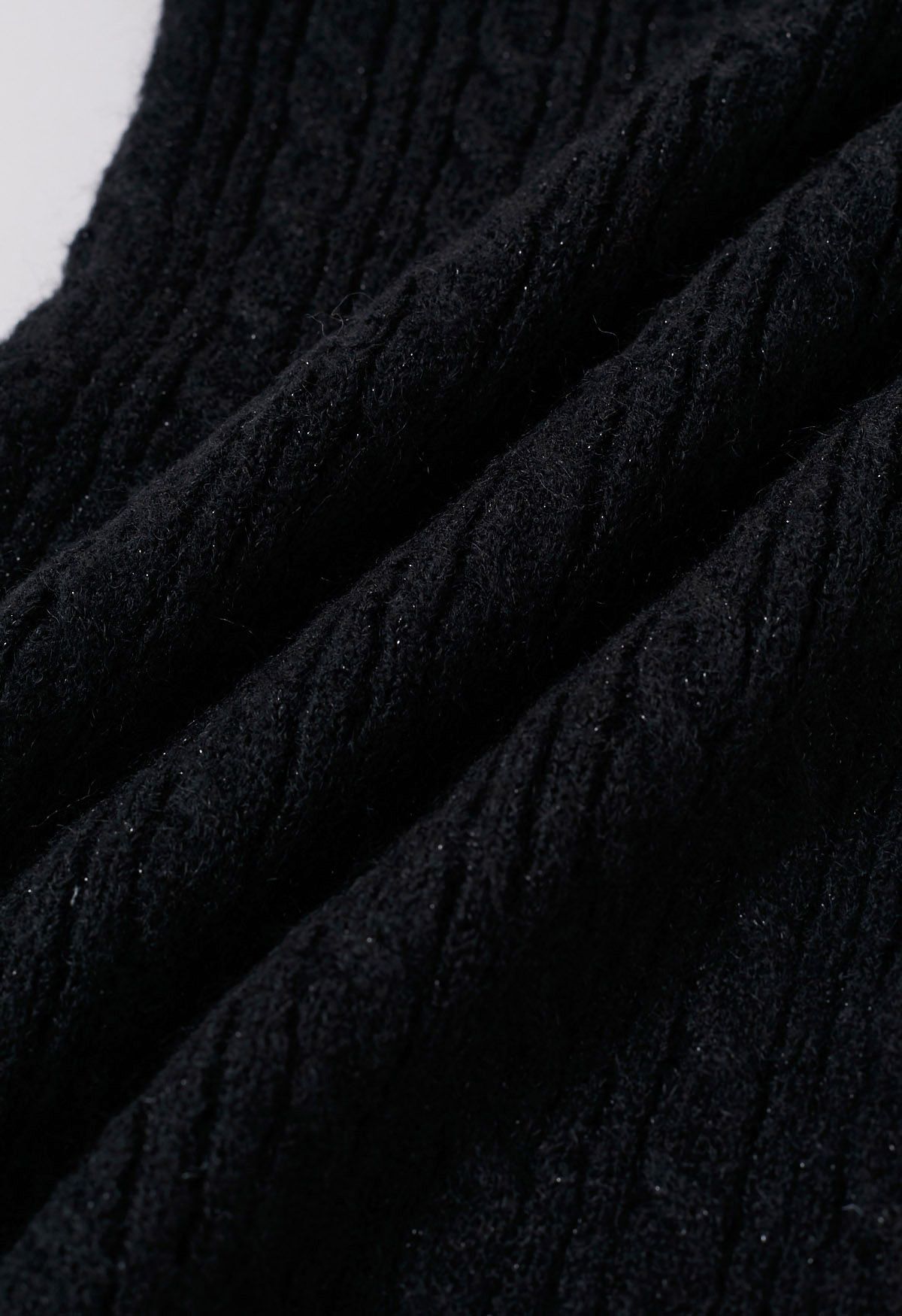 Haut en tricot torsadé à épaules pliées en noir