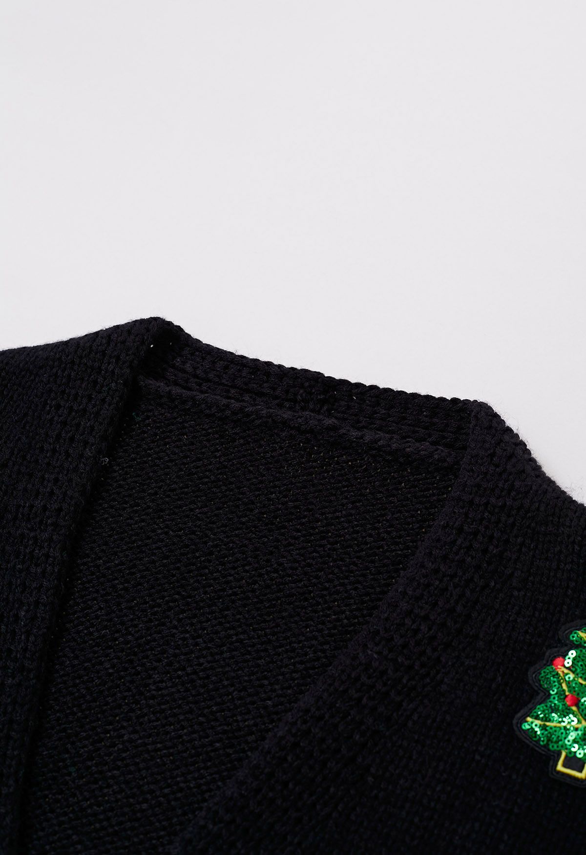 Cardigan boutonné à paillettes avec écusson d'arbre de Noël en noir