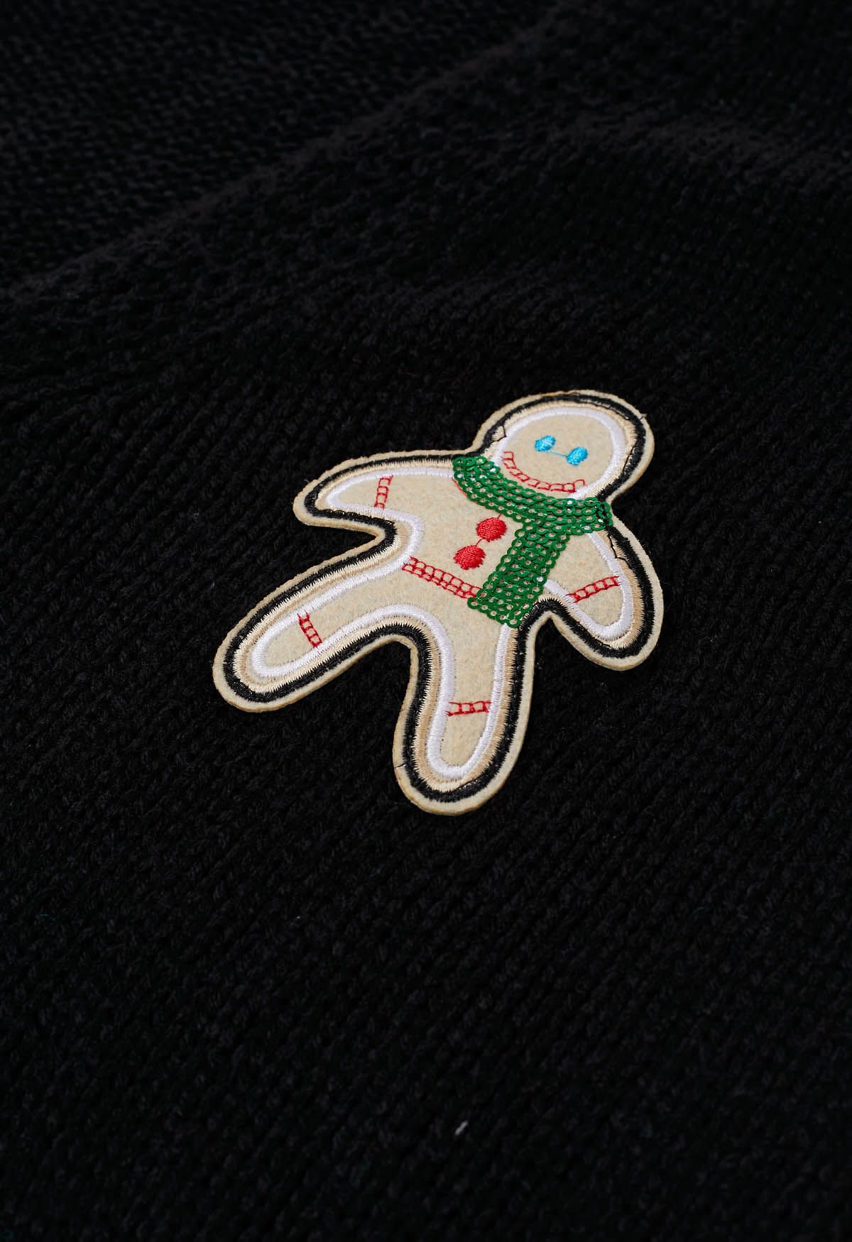 Cardigan en tricot bonhomme en pain d'épice à paillettes et bas de Noël en noir