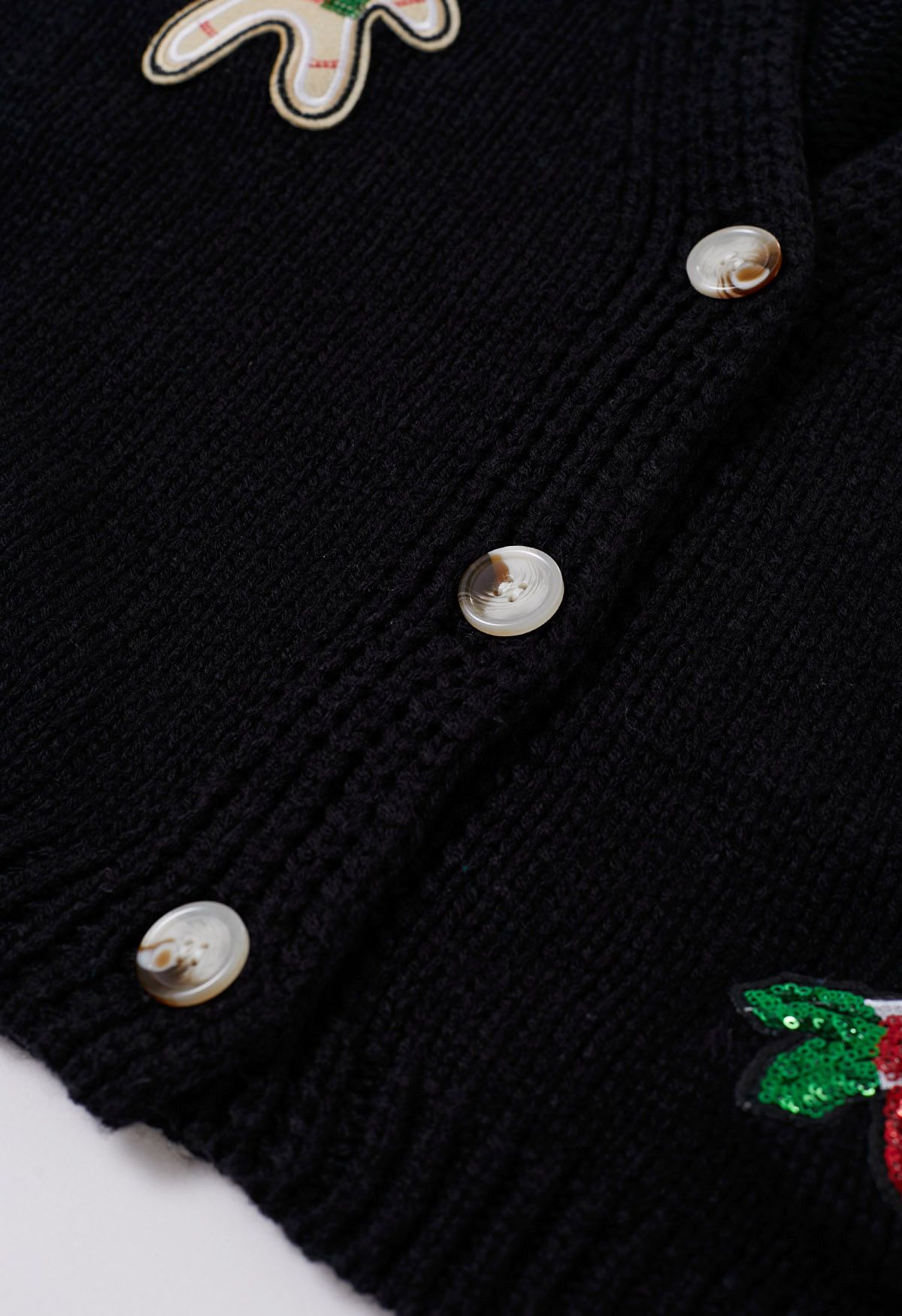 Cardigan en tricot bonhomme en pain d'épice à paillettes et bas de Noël en noir