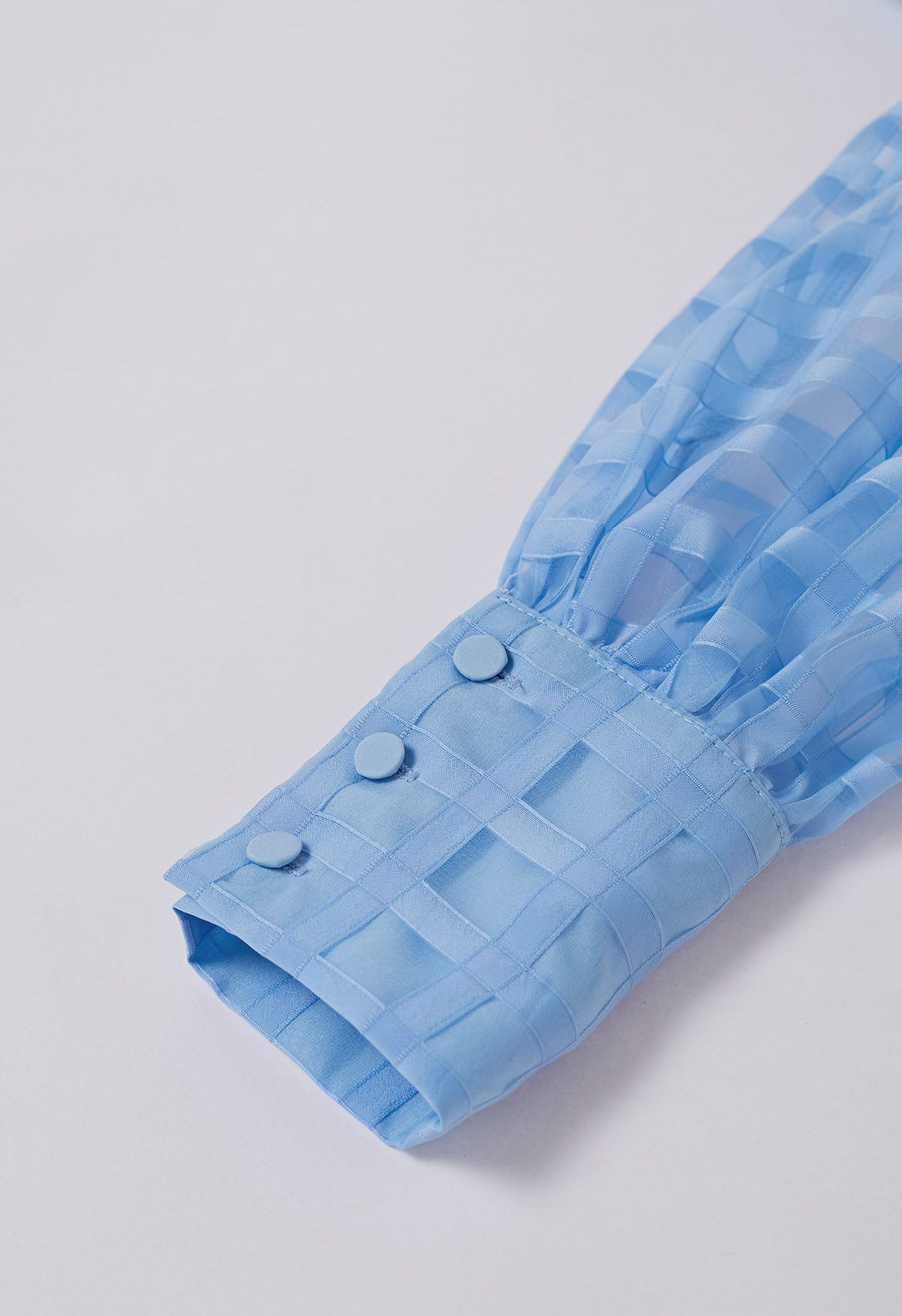 Chemise boutonnée à motif à carreaux en bleu