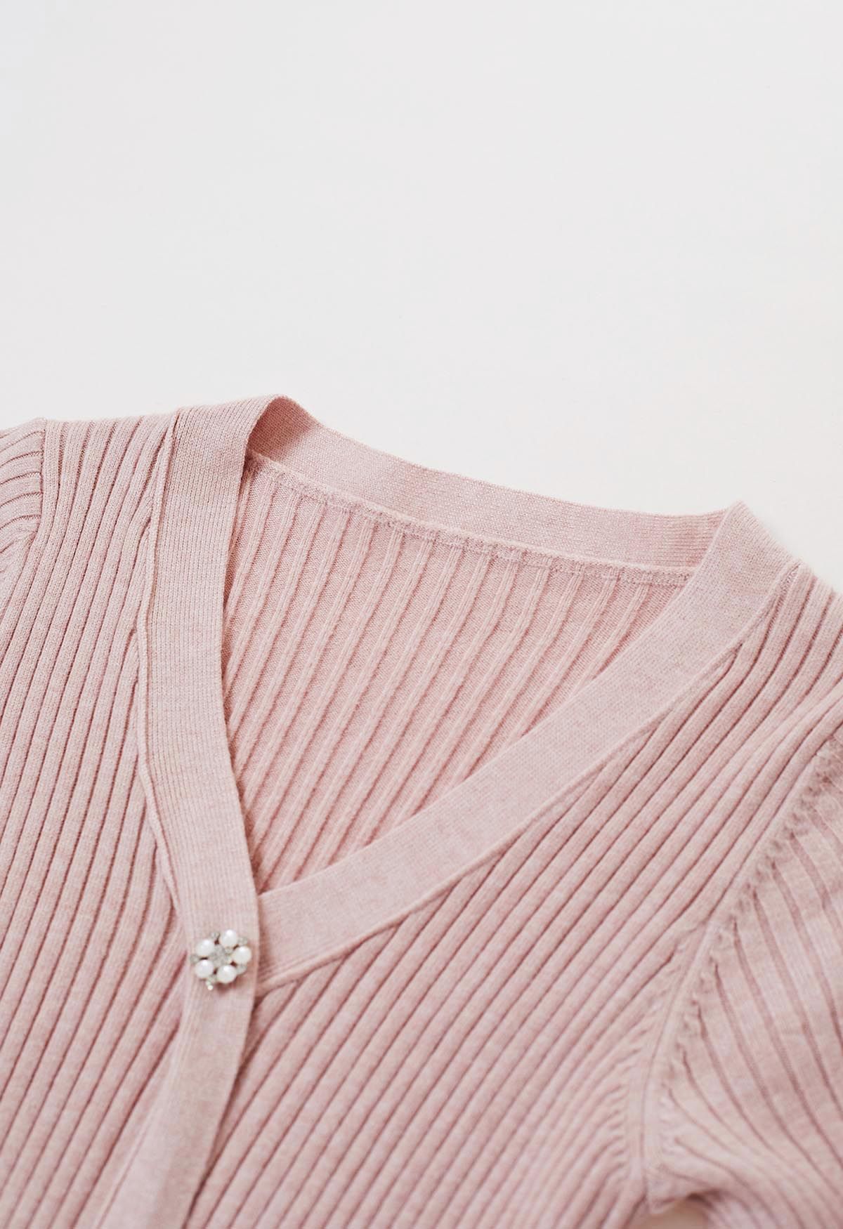Robe midi trapèze en tricot côtelé boutonnée sur le devant en rose