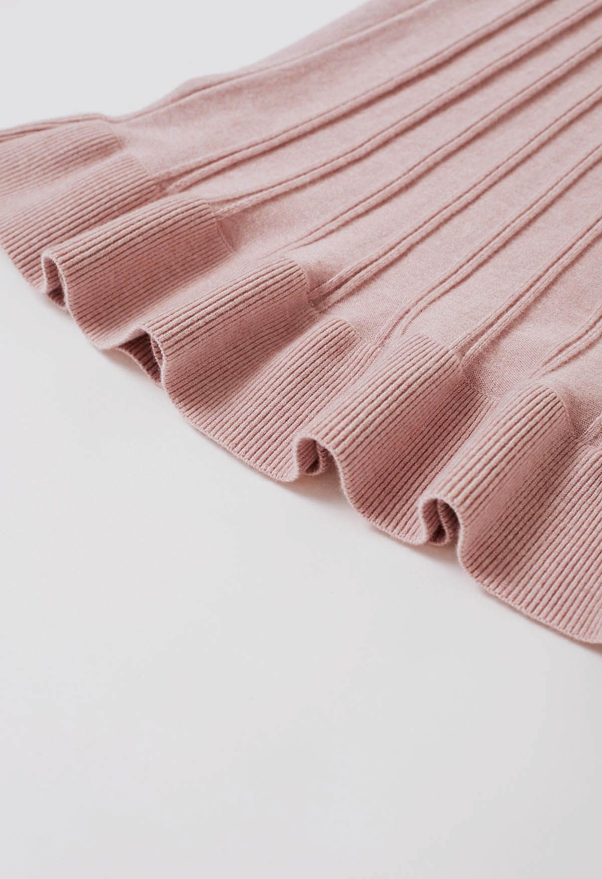 Robe midi trapèze en tricot côtelé boutonnée sur le devant en rose