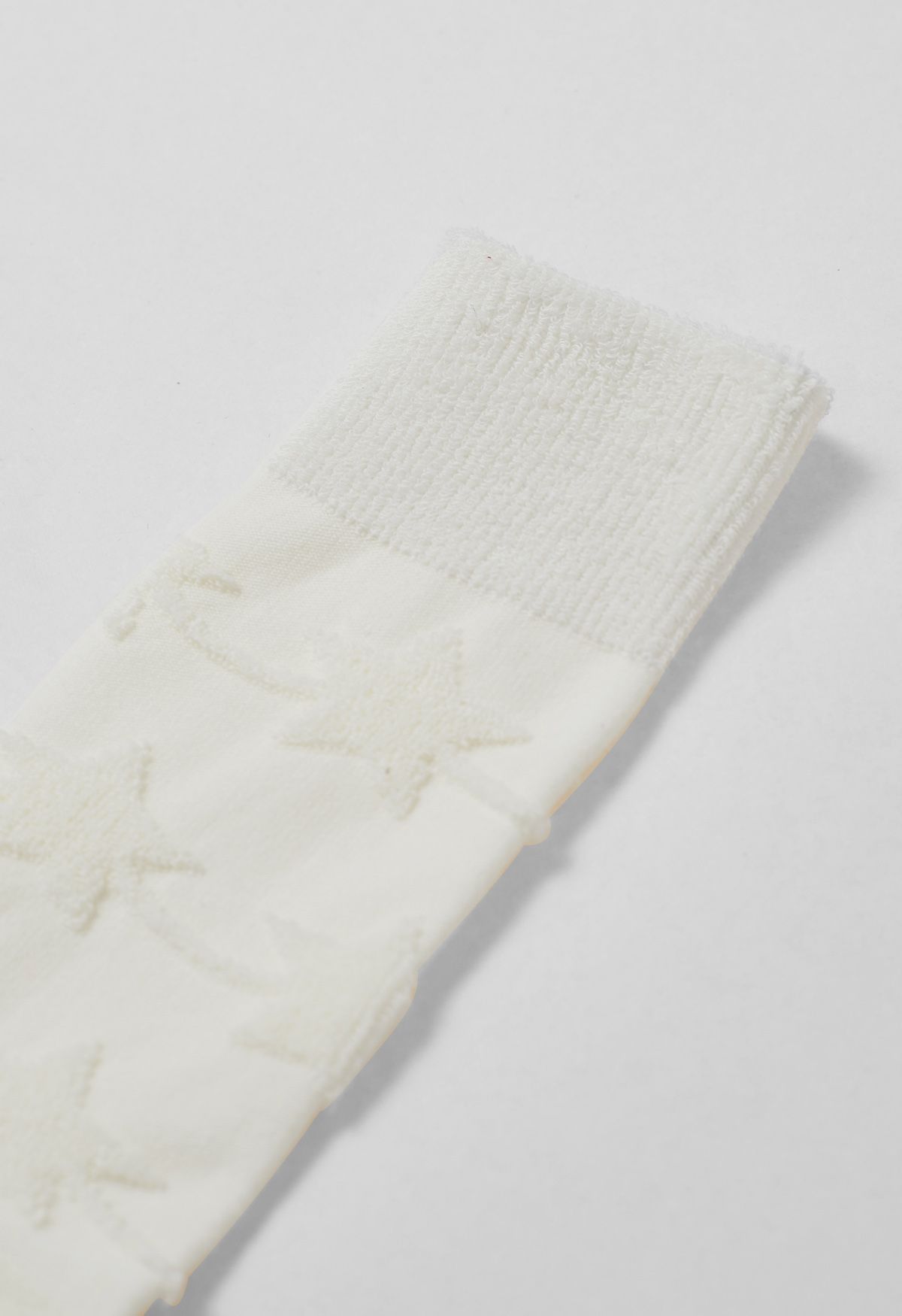 Chaussettes mi-mollet gaufrées Christmas Vibe en blanc