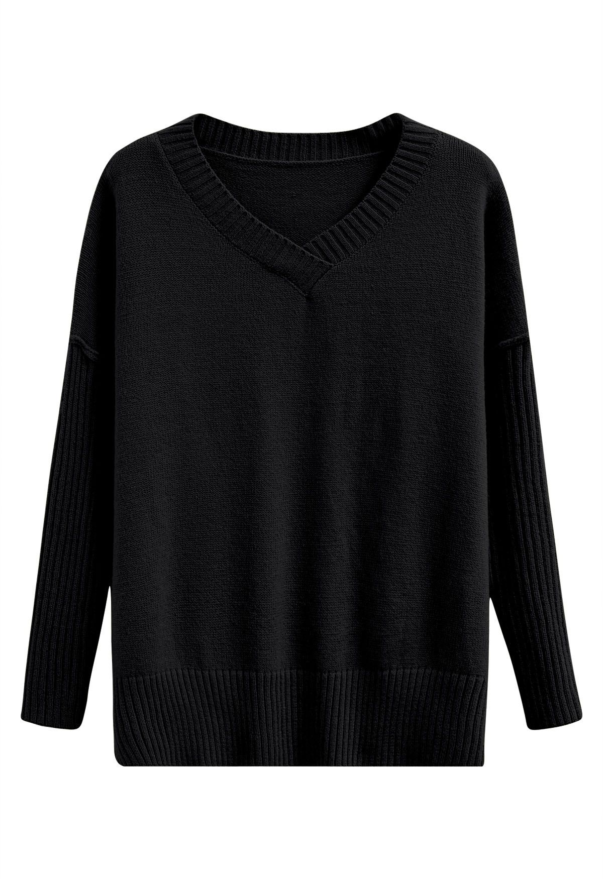 Pull en tricot ample à épaules tombantes et fente latérale en noir