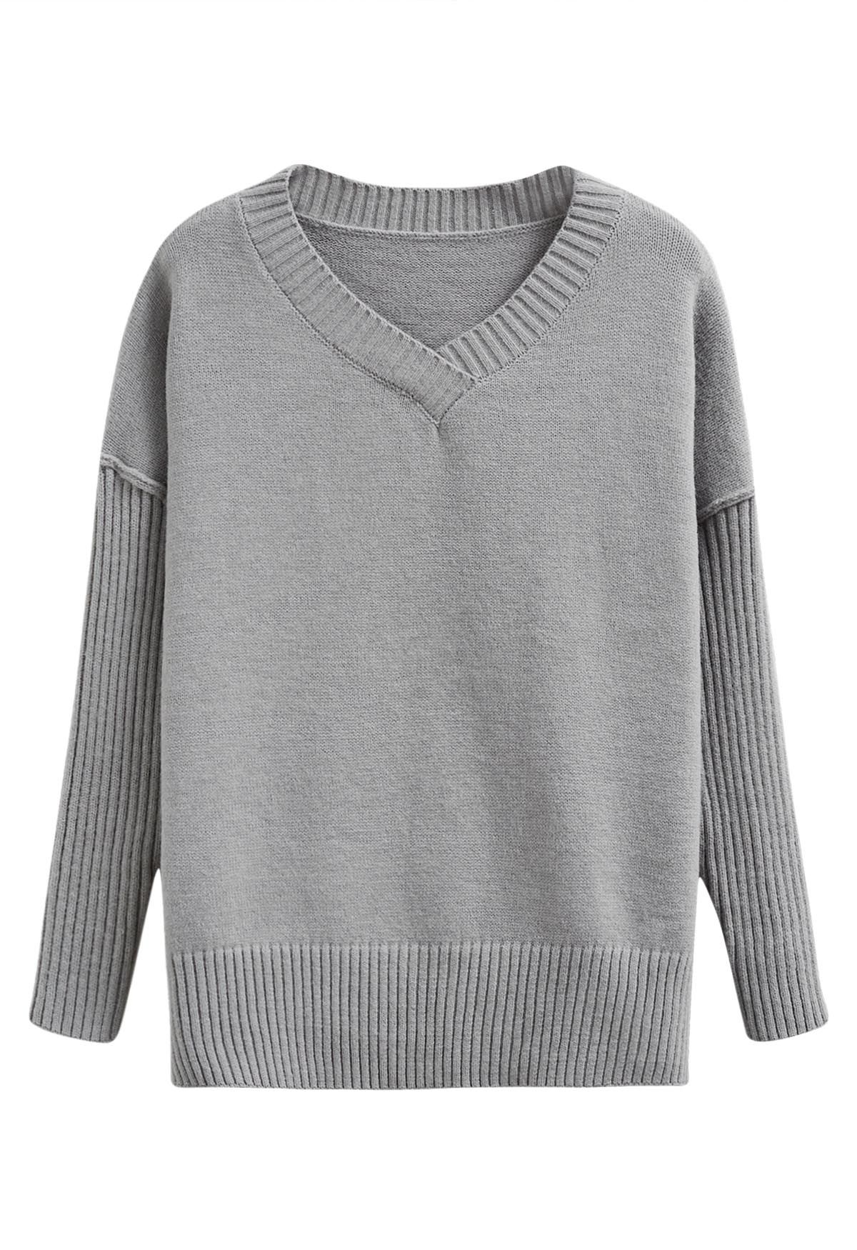 Pull en tricot ample à épaules tombantes et fente latérale en gris