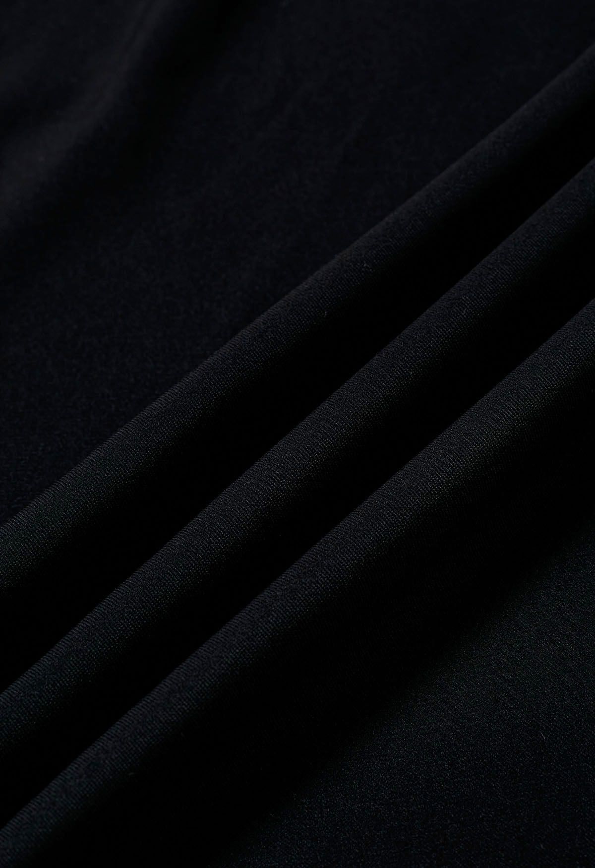Robe chemise mi-longue portefeuille boutonnée en noir
