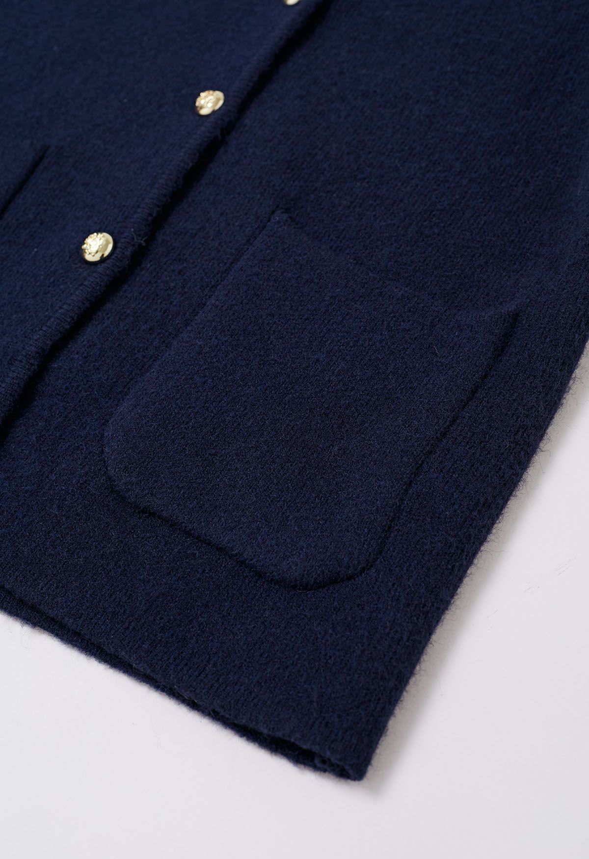 Manteau sans col avec poches plaquées et col en V en bleu marine