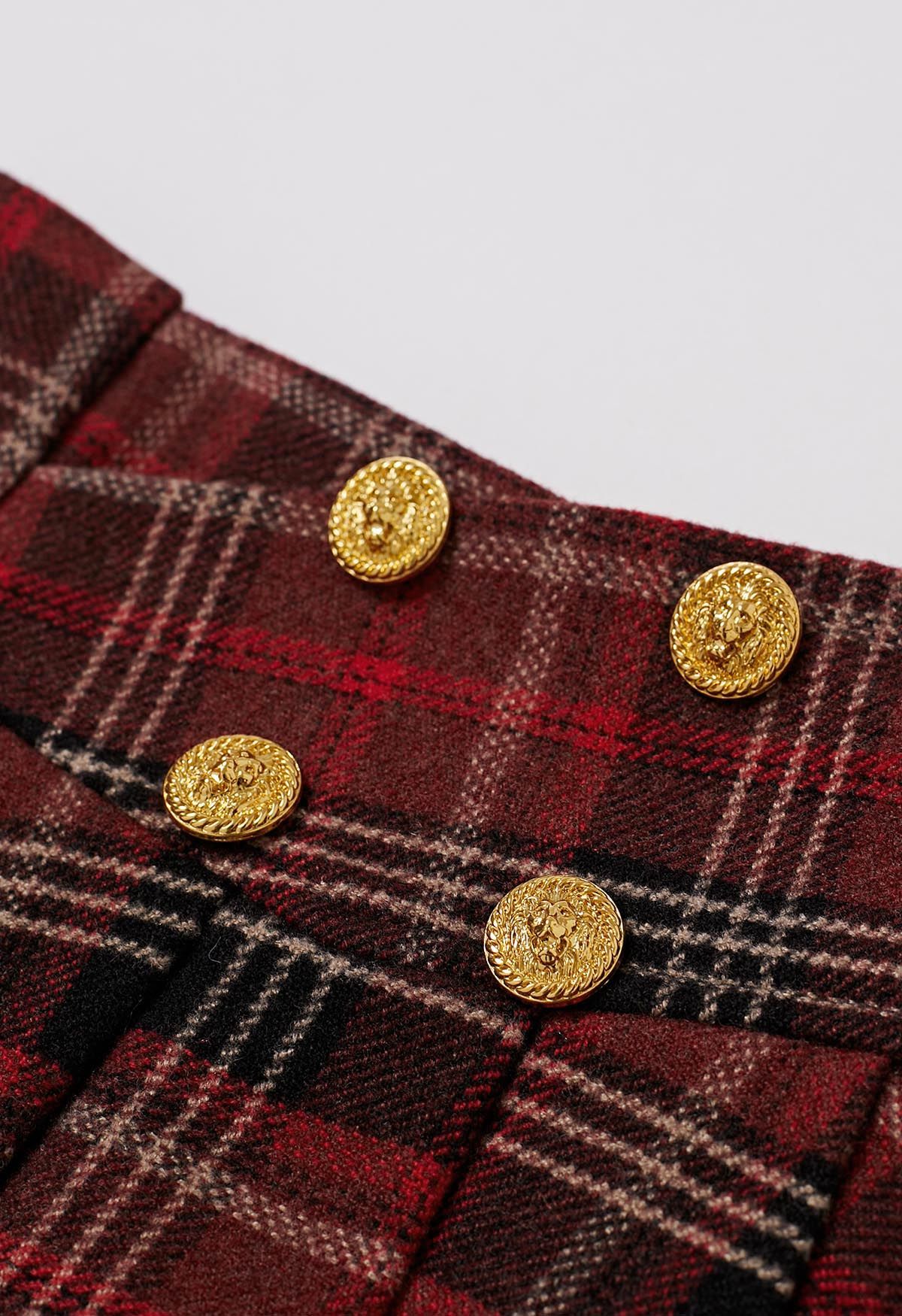 Mini-jupe plissée en laine mélangée à boutons dorés à carreaux bordeaux