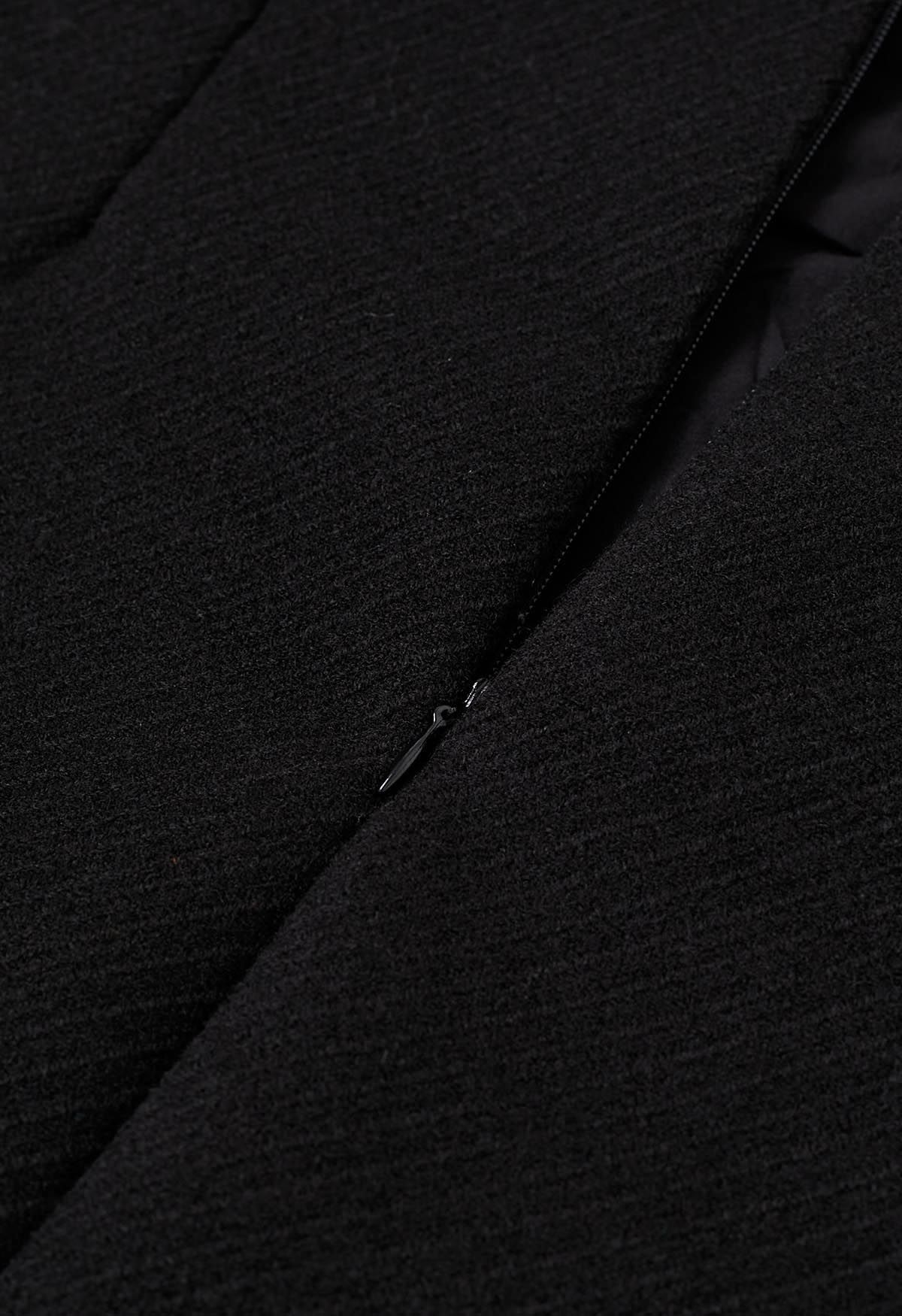 Mini-jupe à rabat en laine mélangée à ourlet cranté en noir