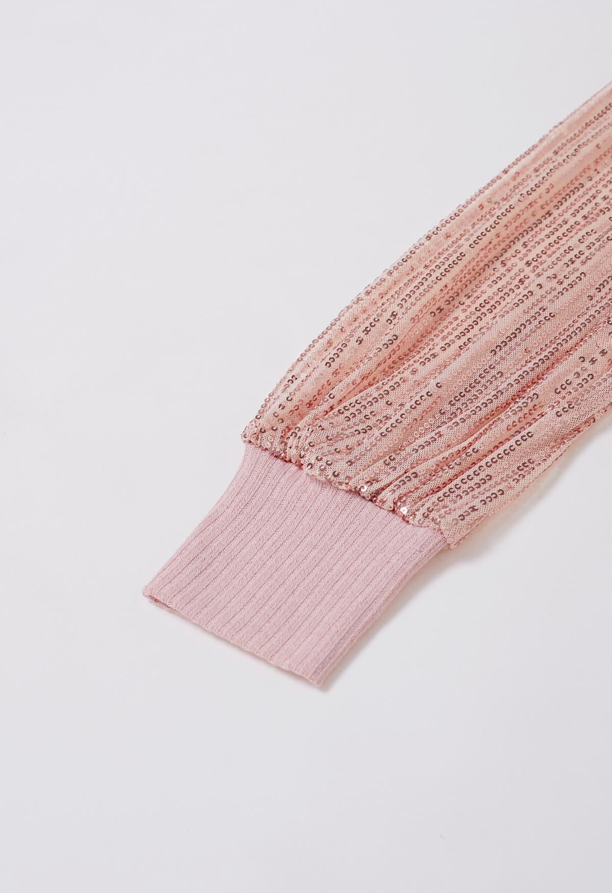 Haut en tricot à col montant et manches en maille pailletée en rose