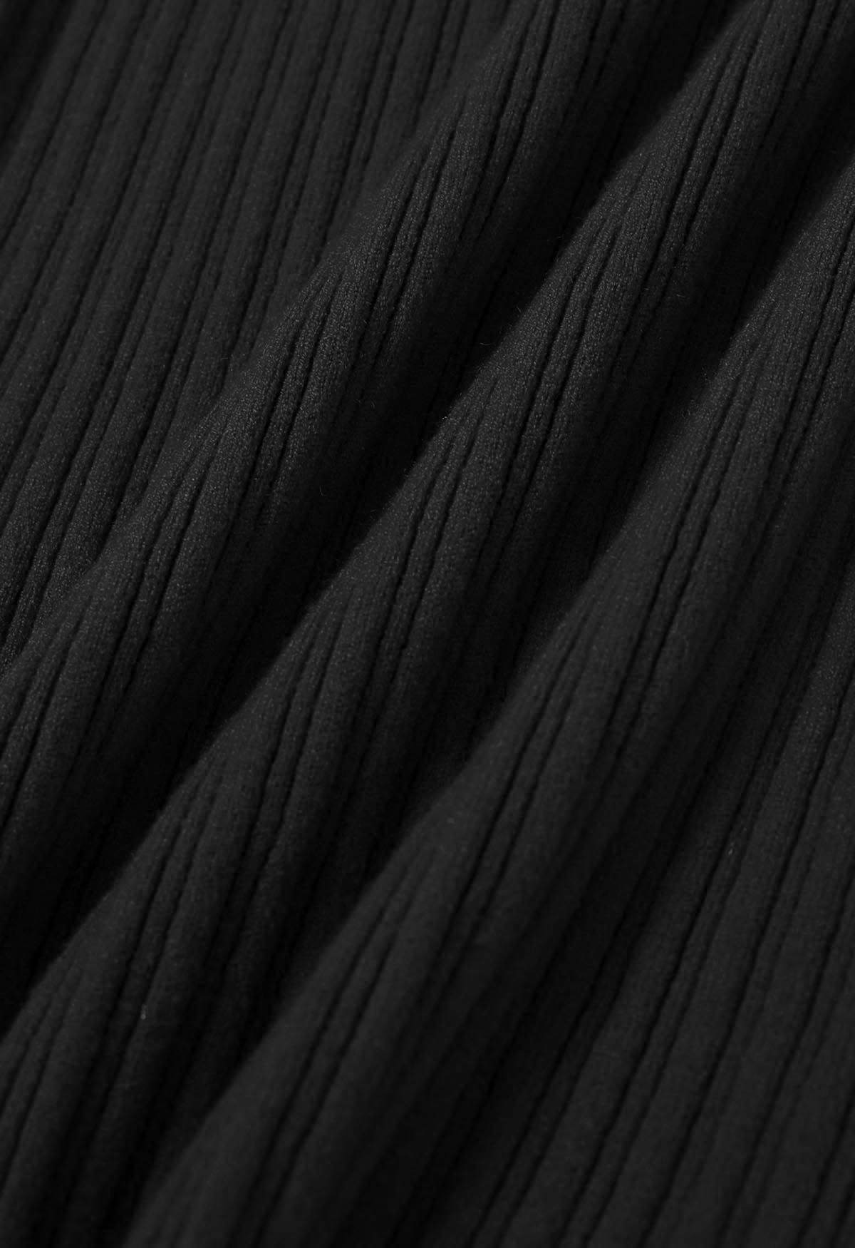 Haut en tricot à col carré orné de boutons en noir