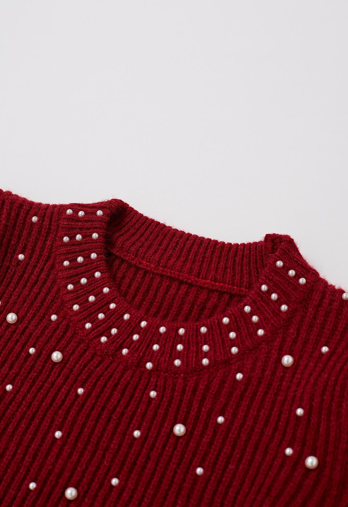 Pull en tricot à manches bouffantes orné de perles en rouge