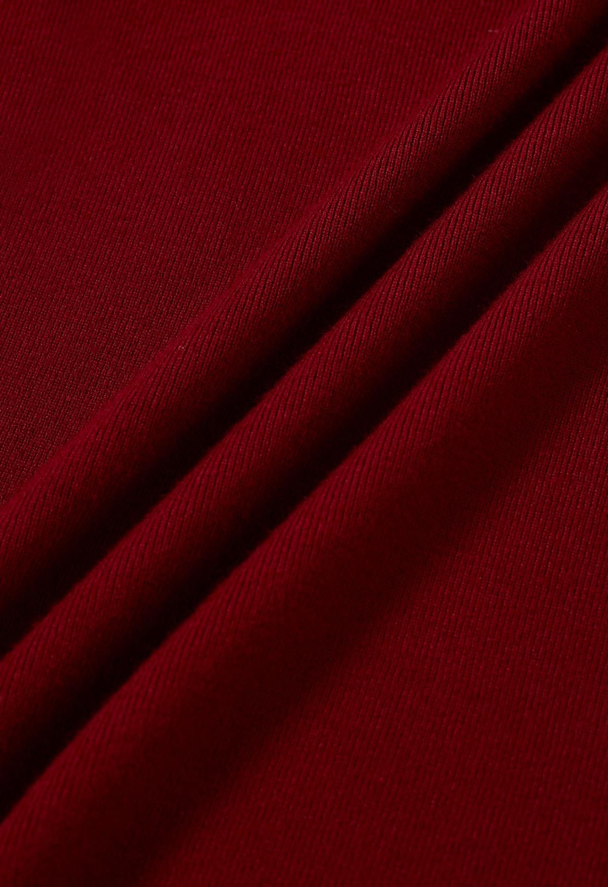 Haut en tricot orné de ruban à manches Gigot en rouge