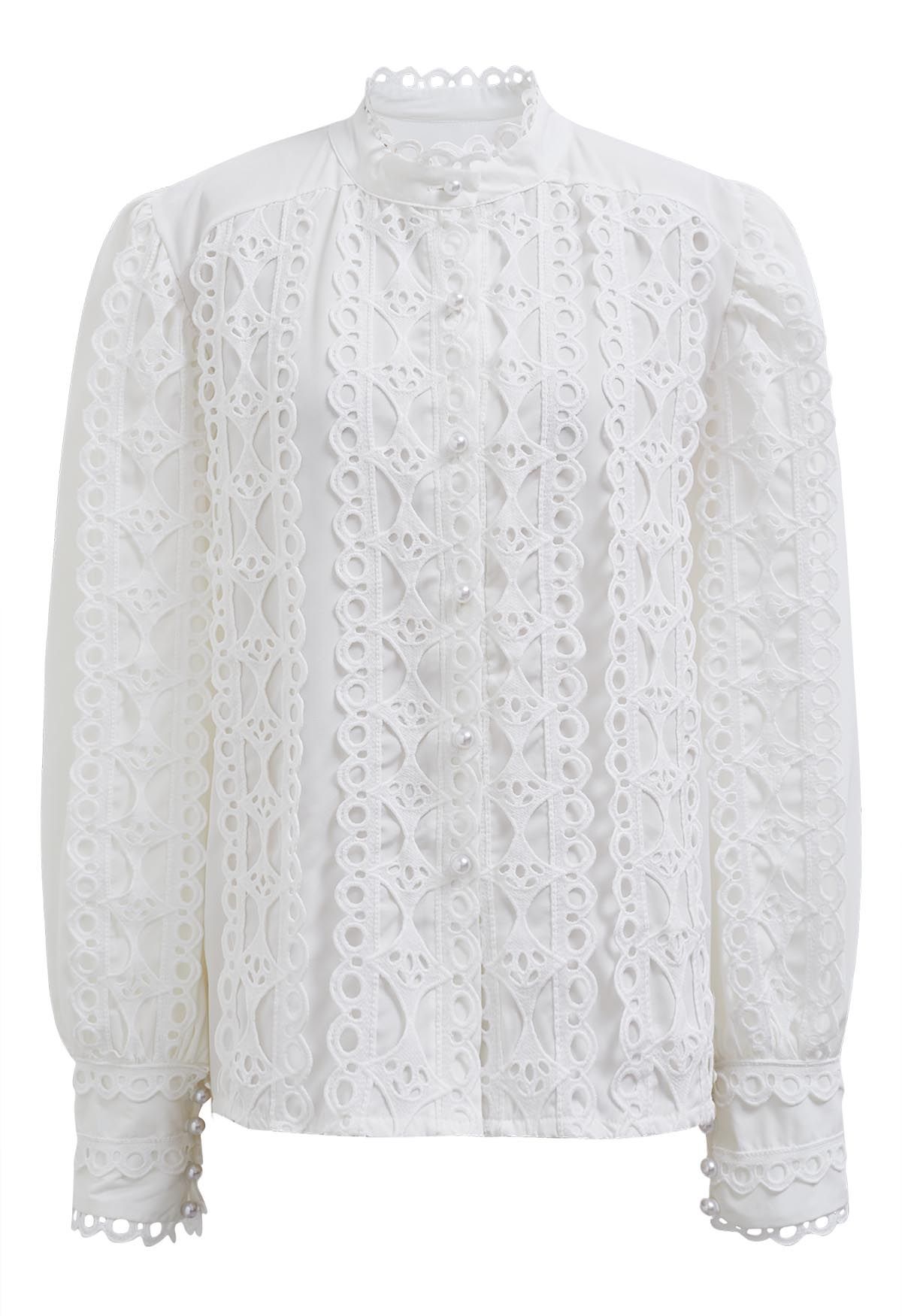 Chemise boutonnée à manches bulles et découpes exquises en blanc