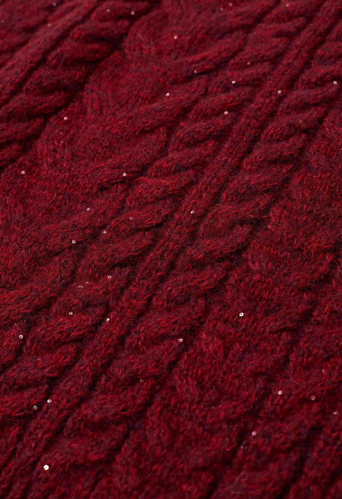 Pull en tricot torsadé à sequins et col roulé en rouge