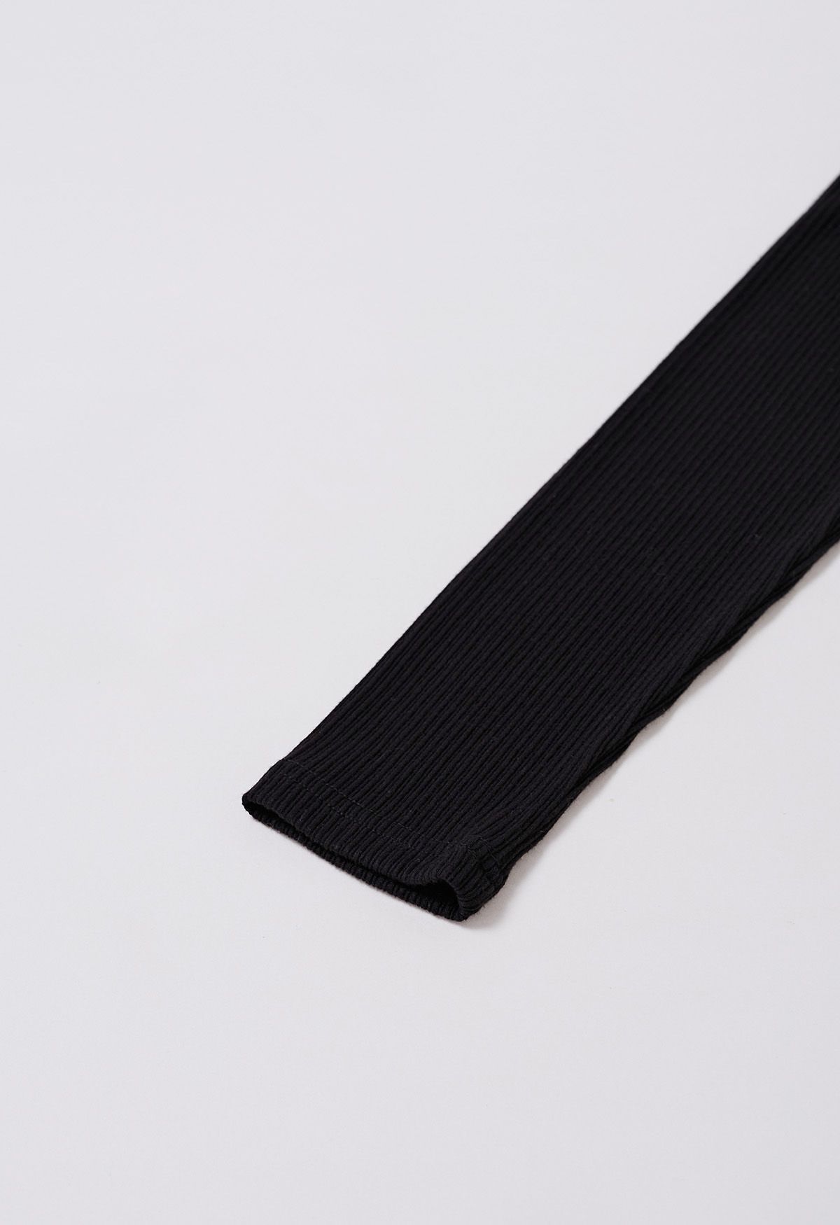Haut en tricot épissé en maille torsadée en noir