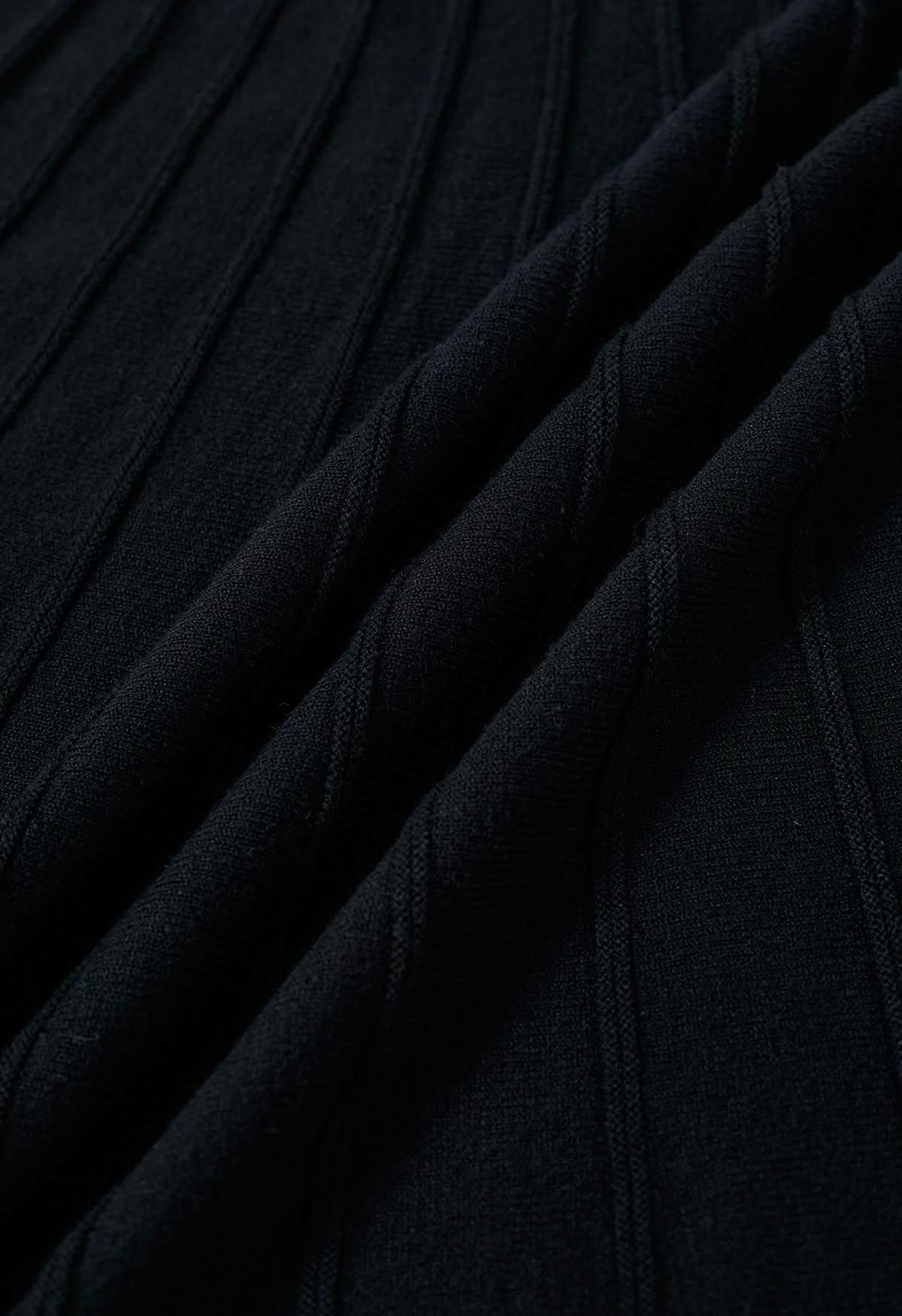 Jupe mi-longue en tricot à coutures ornées de perles argentées en noir
