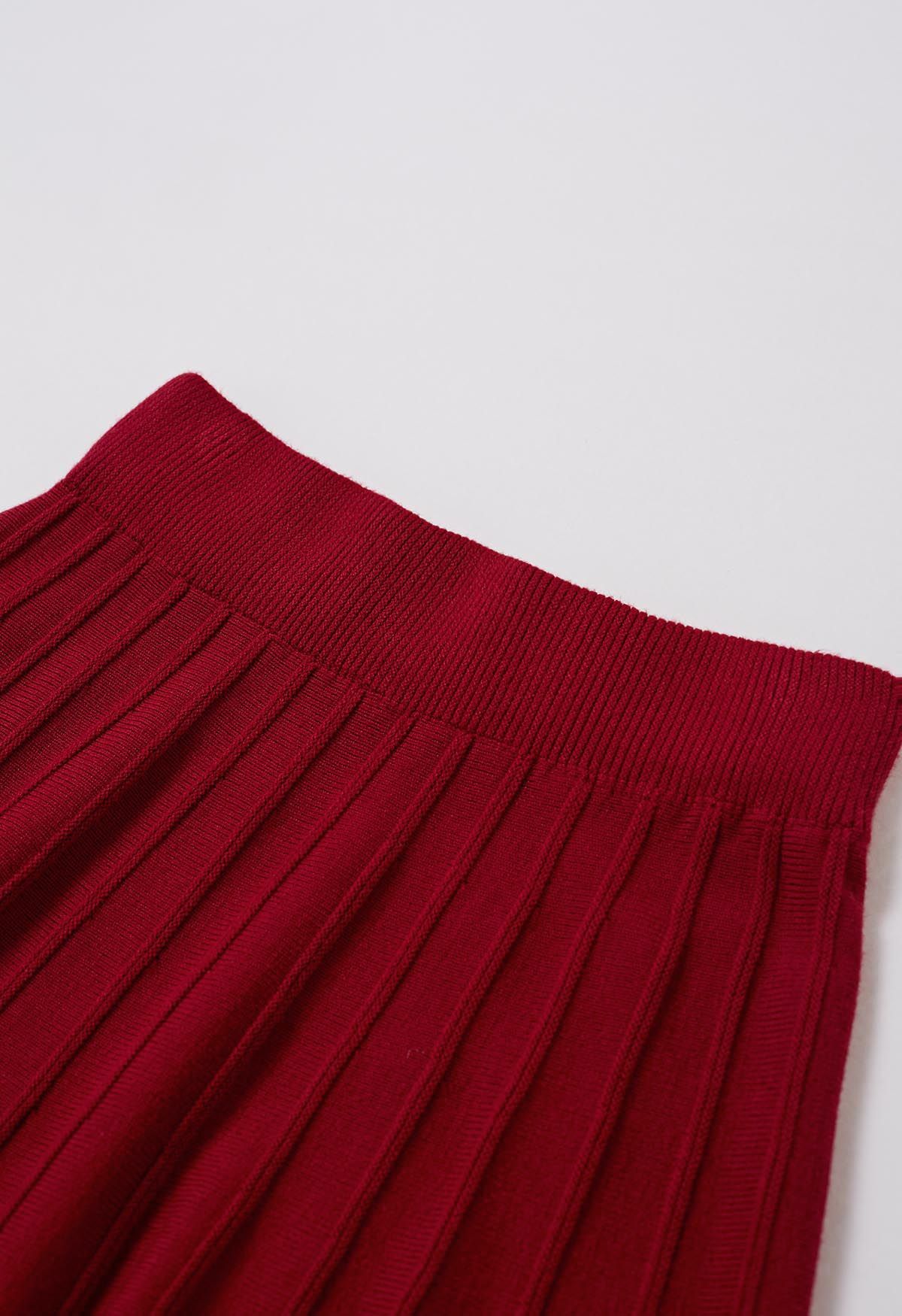 Jupe mi-longue en tricot à coutures ornées de perles argentées en rouge