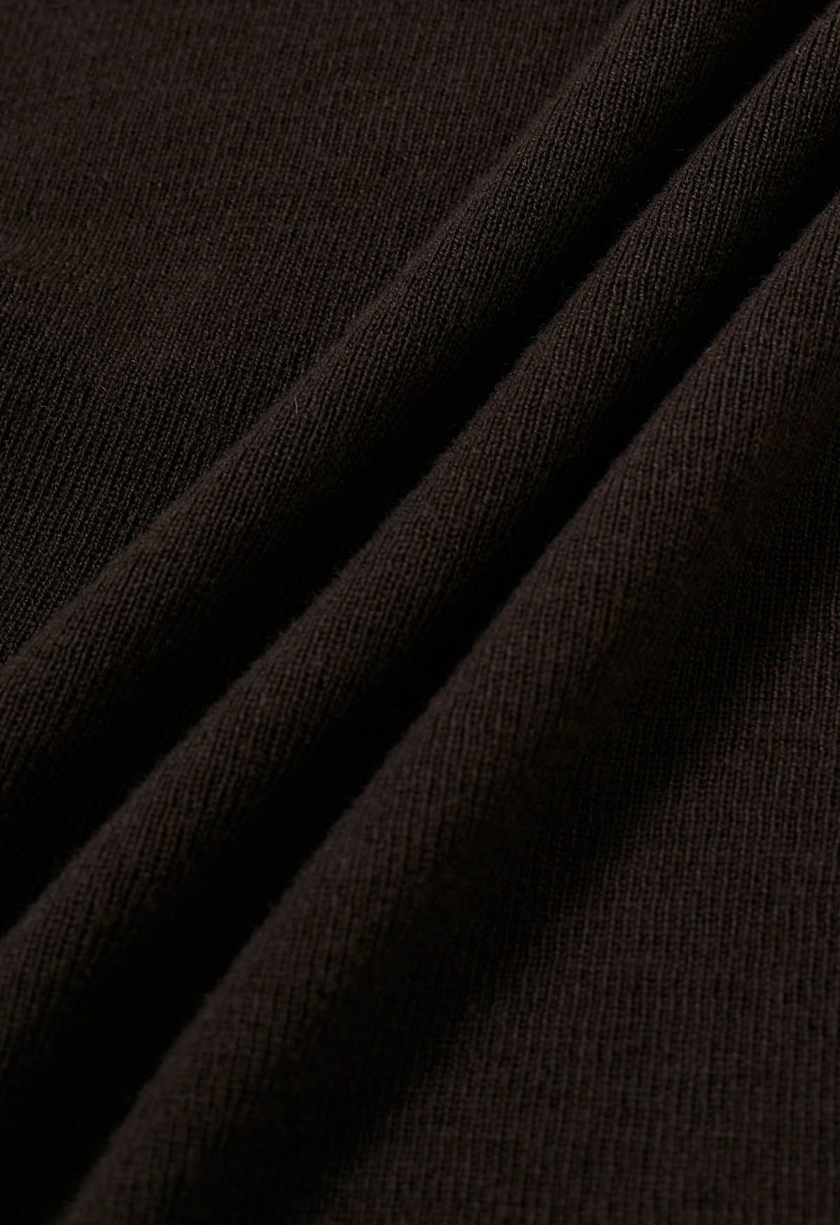 Haut en tricot côtelé à col haut et plis latéraux en marron