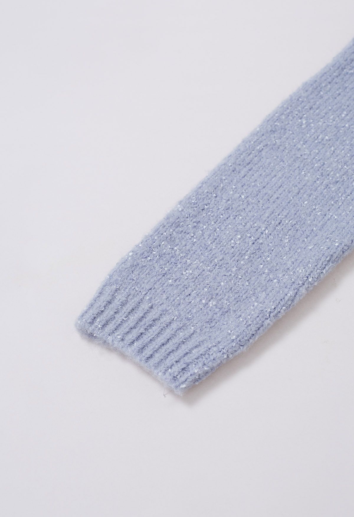 Pull en tricot à bords côtelés et épaules tombantes en bleu