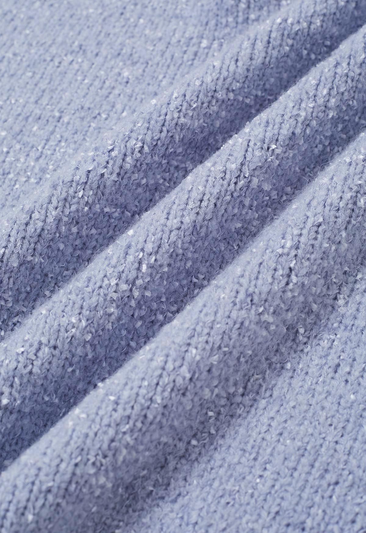 Pull en tricot à bords côtelés et épaules tombantes en bleu