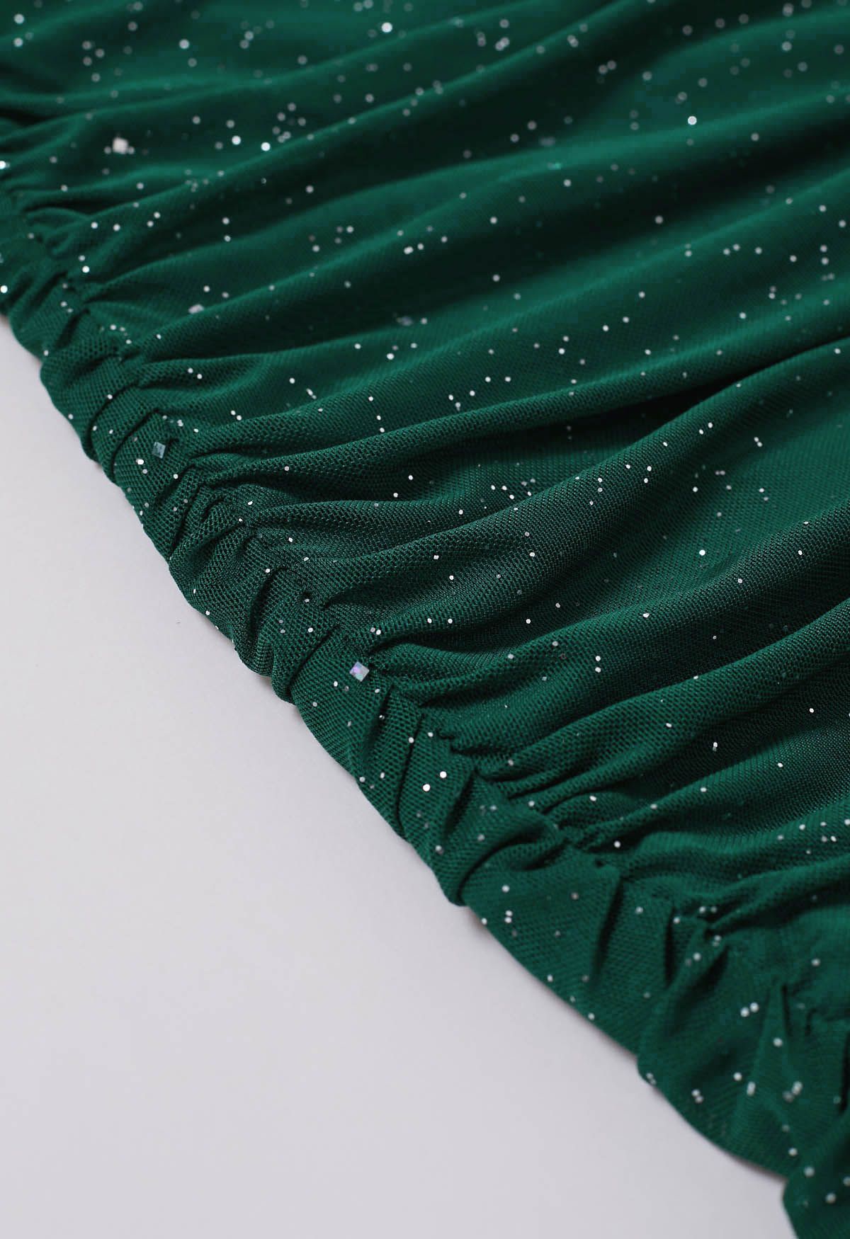 Mini-robe moulante en maille froncée à col en V pailleté en vert foncé