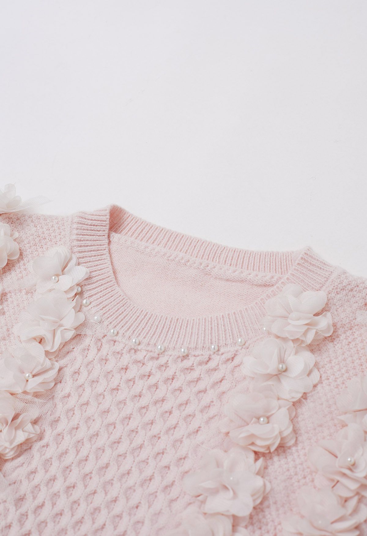 Pull en tricot nacré à fleurs 3D en rose