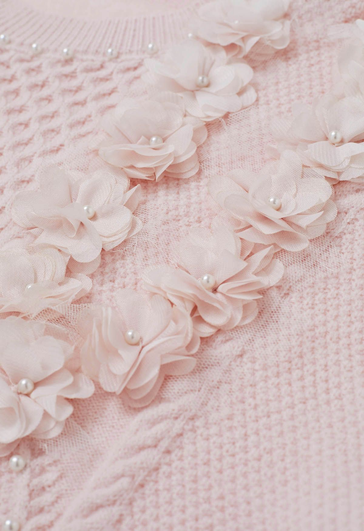Pull en tricot nacré à fleurs 3D en rose