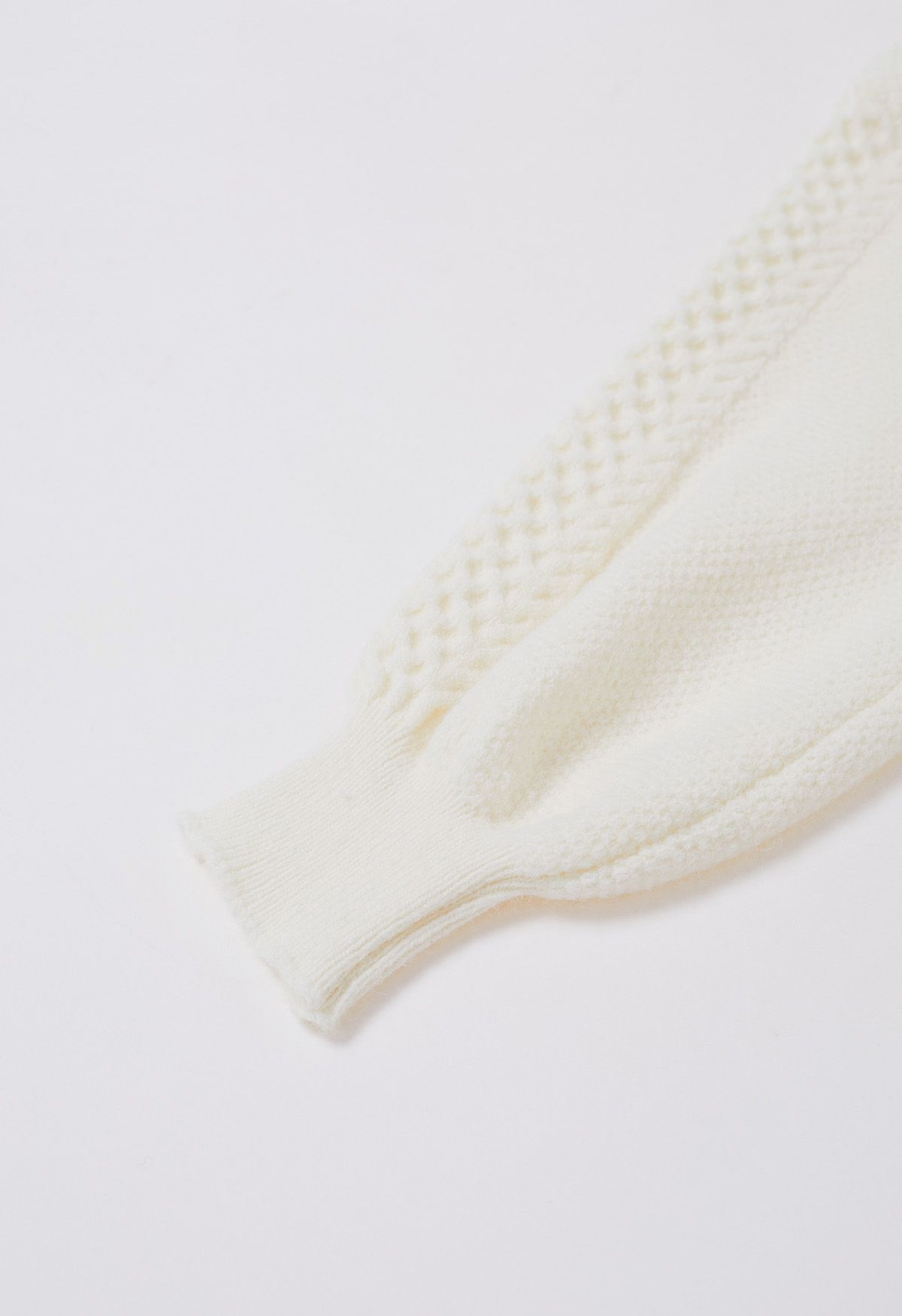 Pull en tricot nacré à fleurs 3D en ivoire