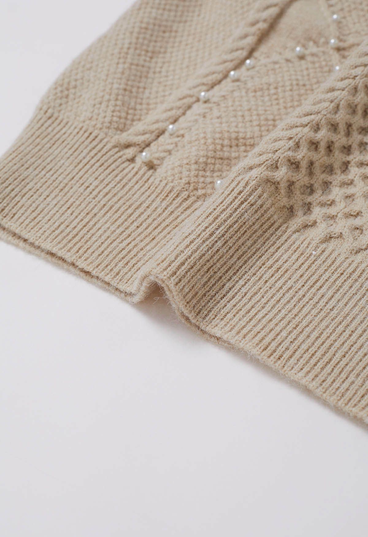 Pull en tricot nacré à fleurs 3D en sable