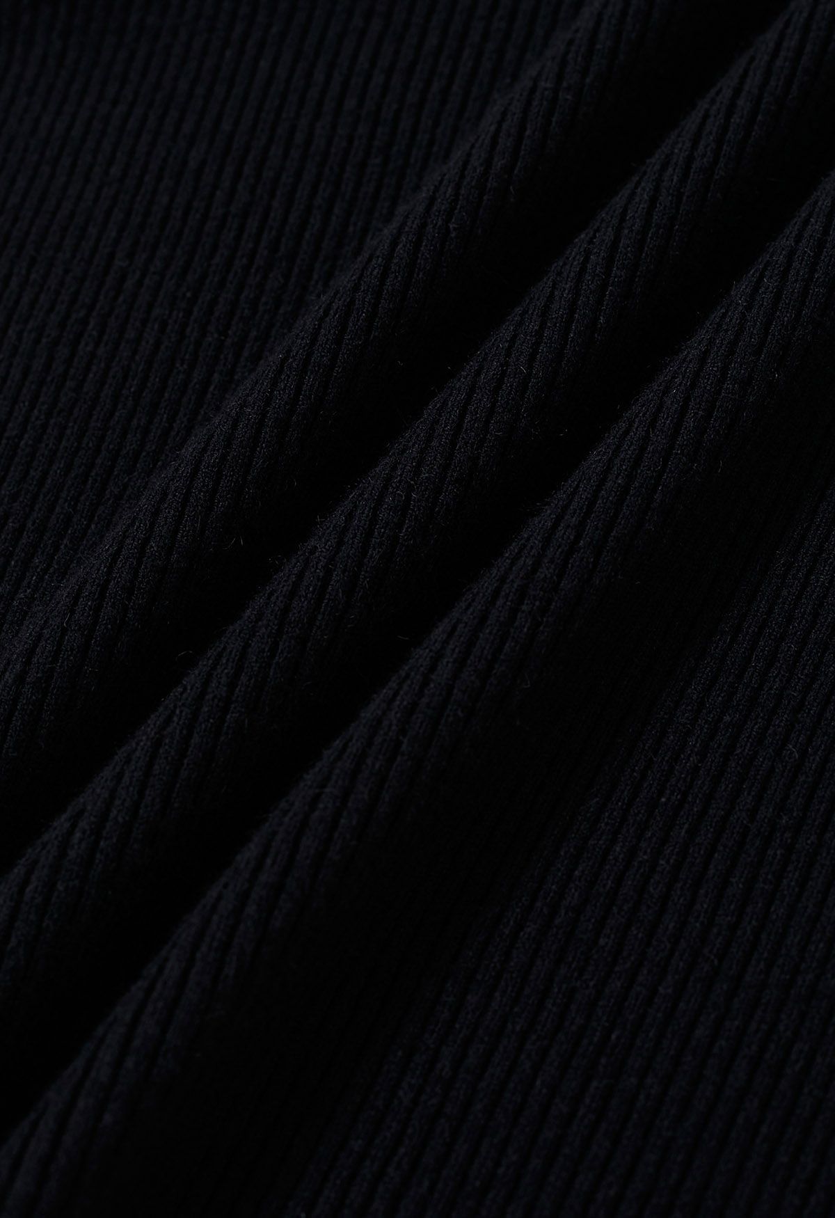 Haut en tricot orné d'organza à volants perlés en noir