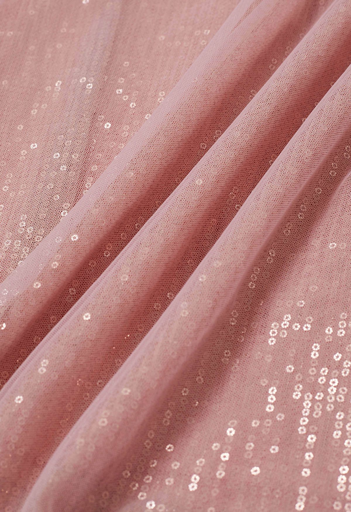 Ravissante jupe mi-longue en tulle et maille à sequins en rose