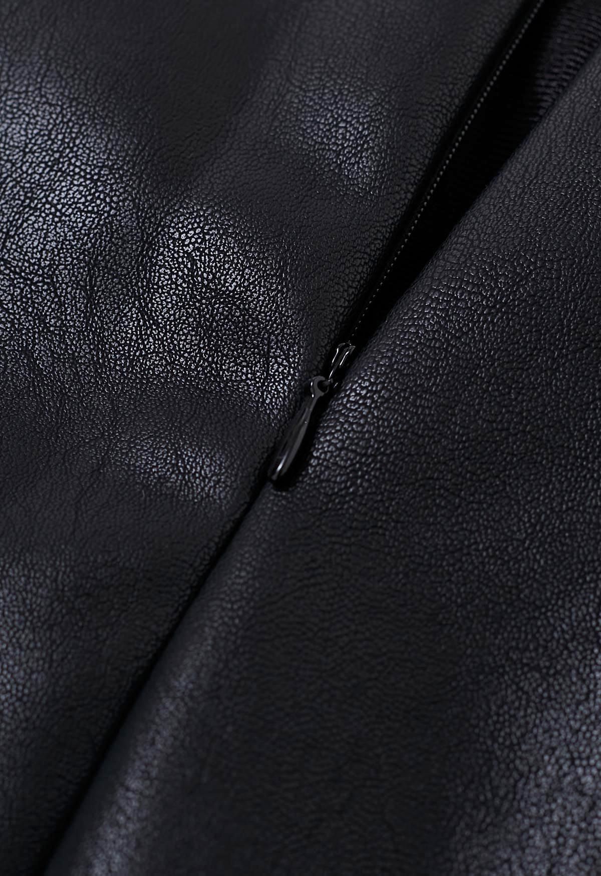 Mini-jupe plissée en faux cuir, noire