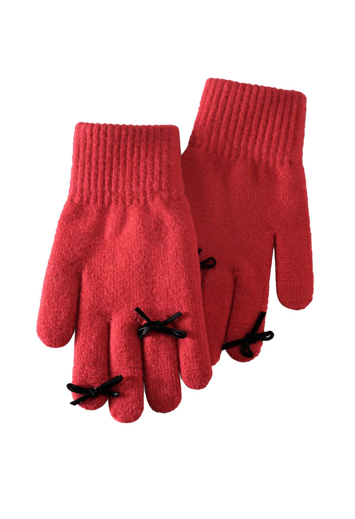 Gants en tricot avec trou pour les doigts et décoration avec nœud papillon en rouge