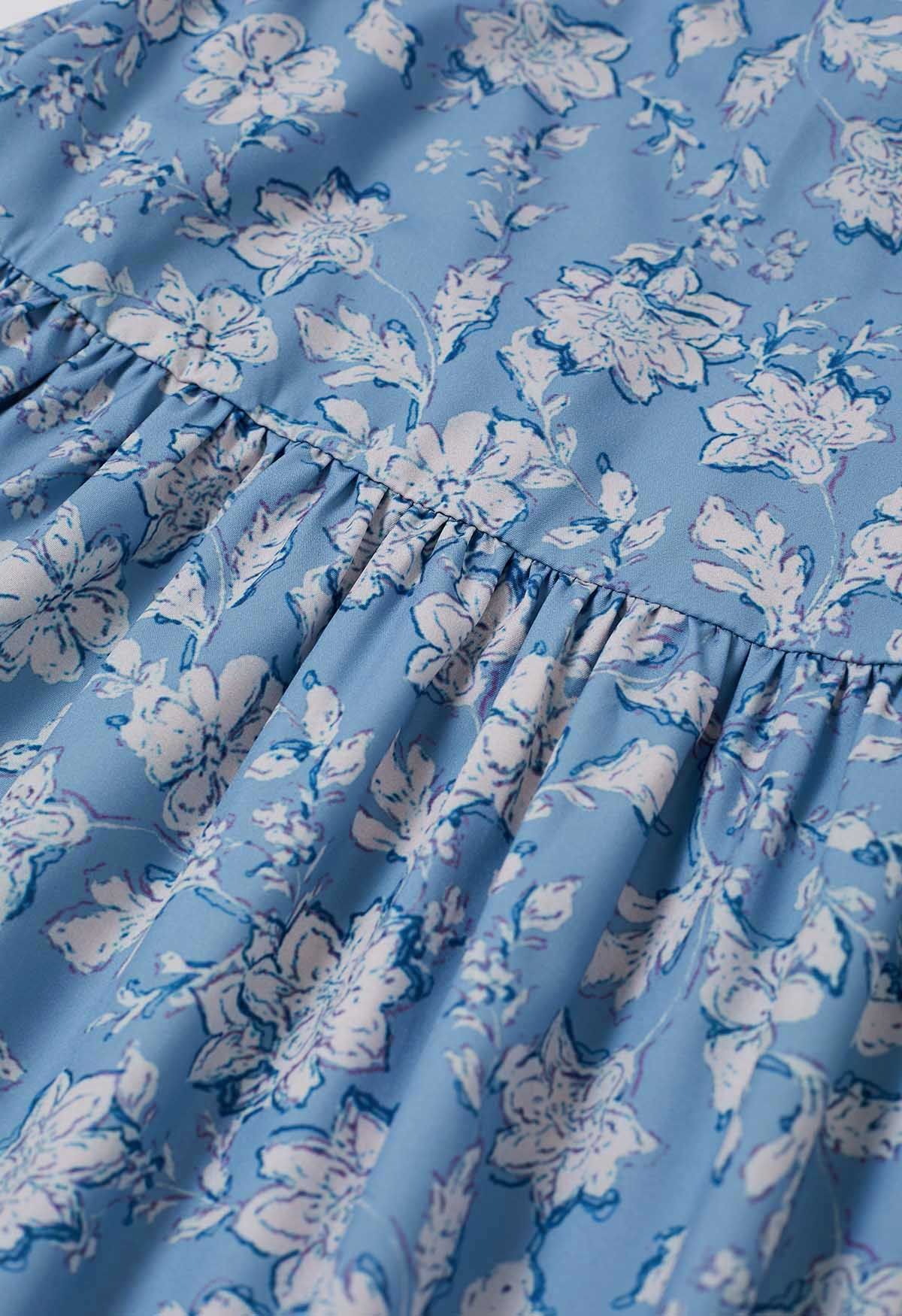 Robe caraco à imprimé floral et nœud papillon au dos en bleu