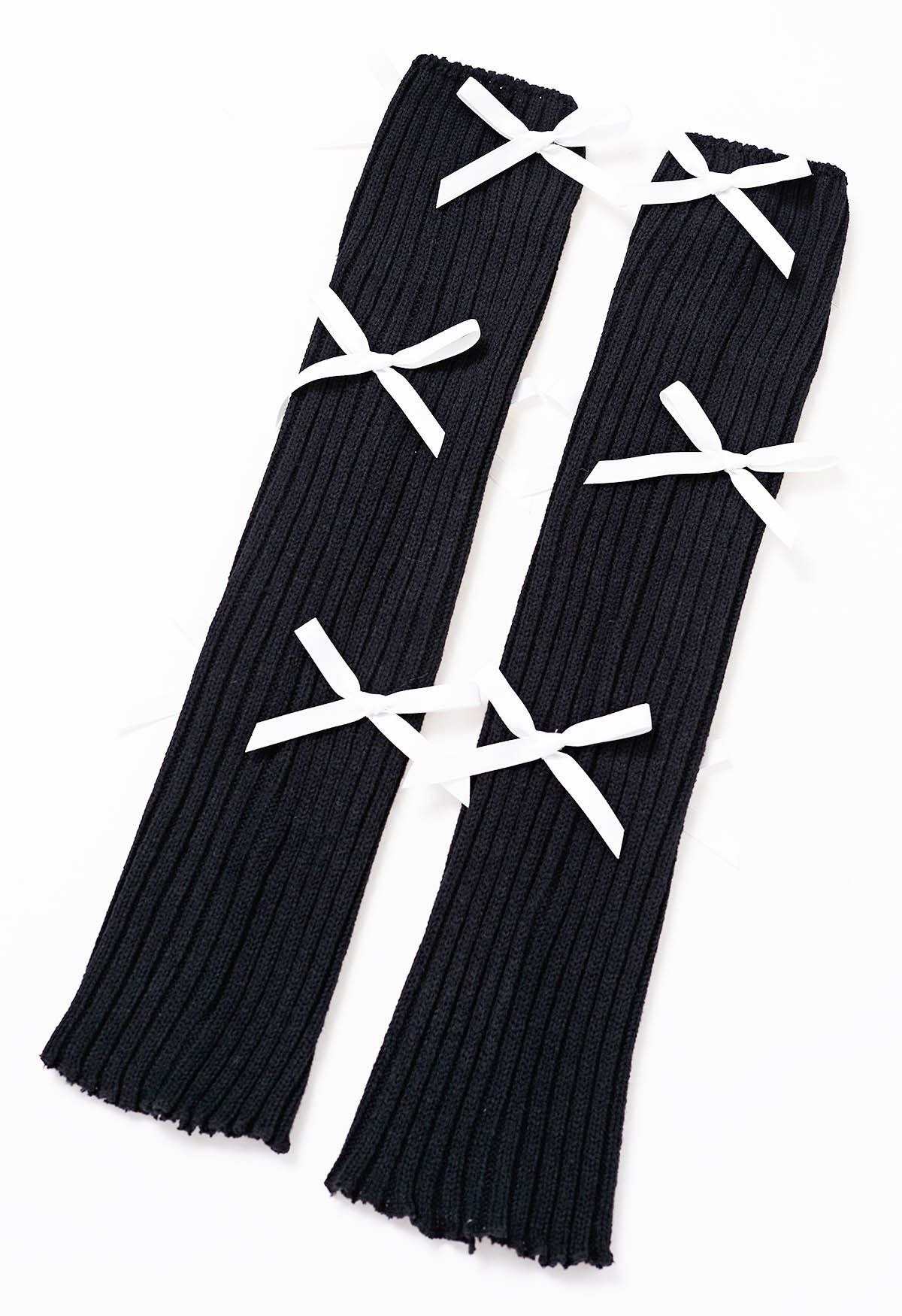 Jambières en tricot à décor de nœud papillon en noir