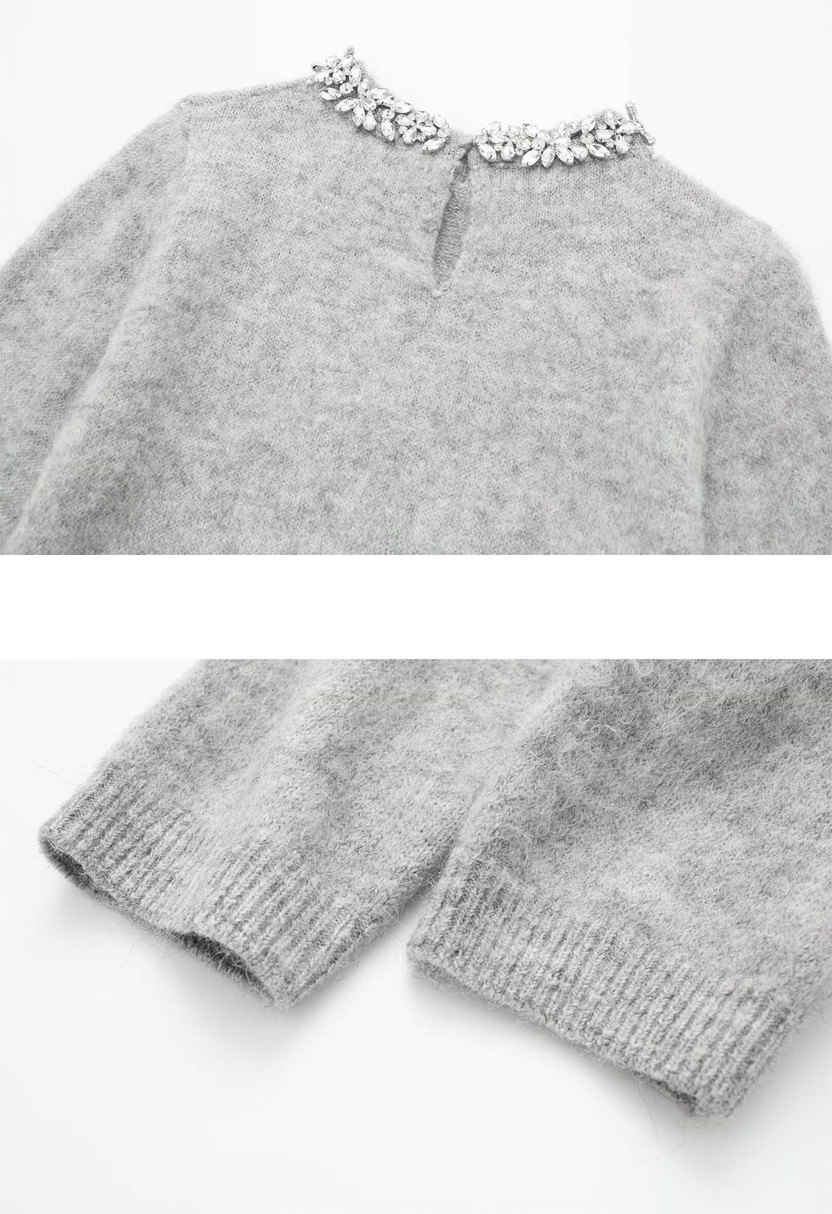 Pull en tricot avec poche avant et encolure en strass