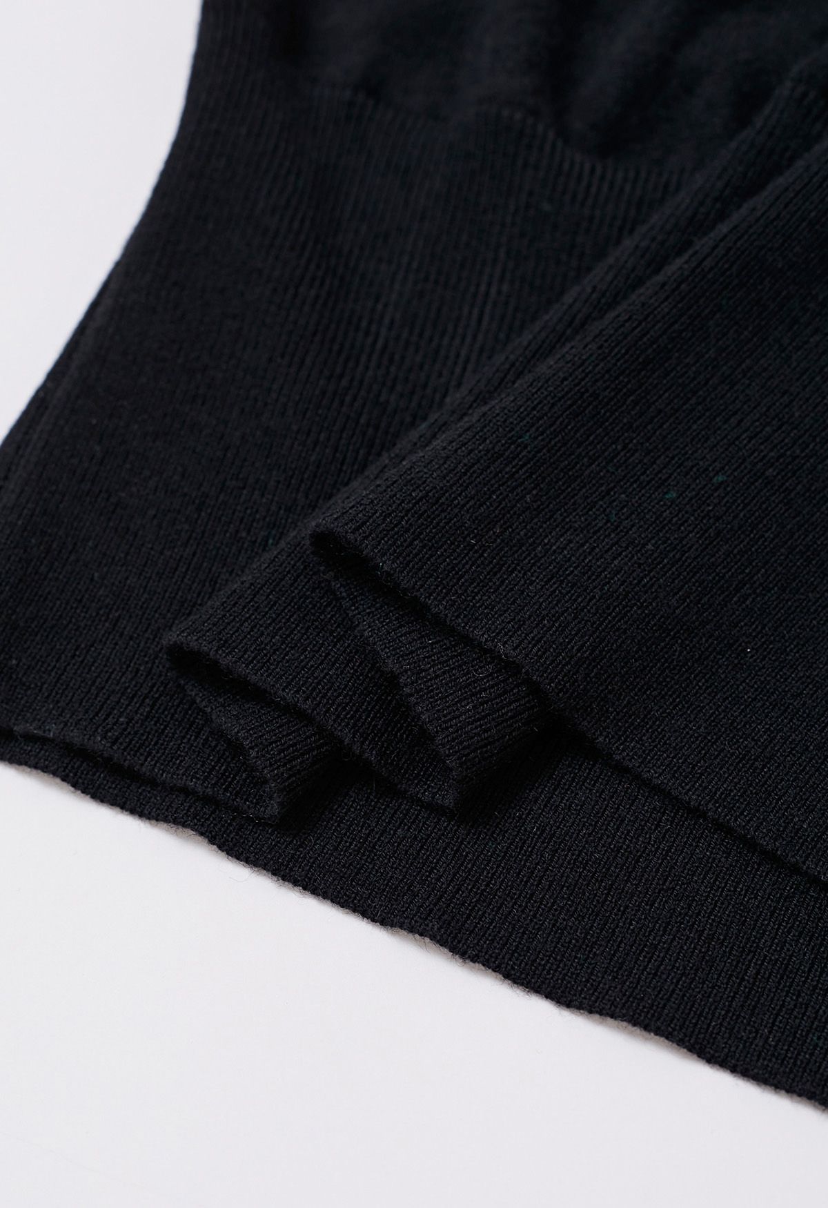 Haut cache-cœur en tricot Effortless Elegance en noir