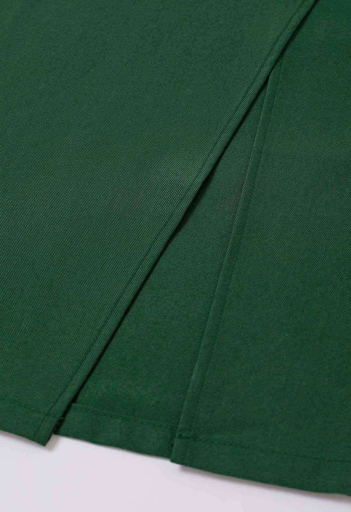 Jupe fendue sur le devant avec poche passepoilée en vert