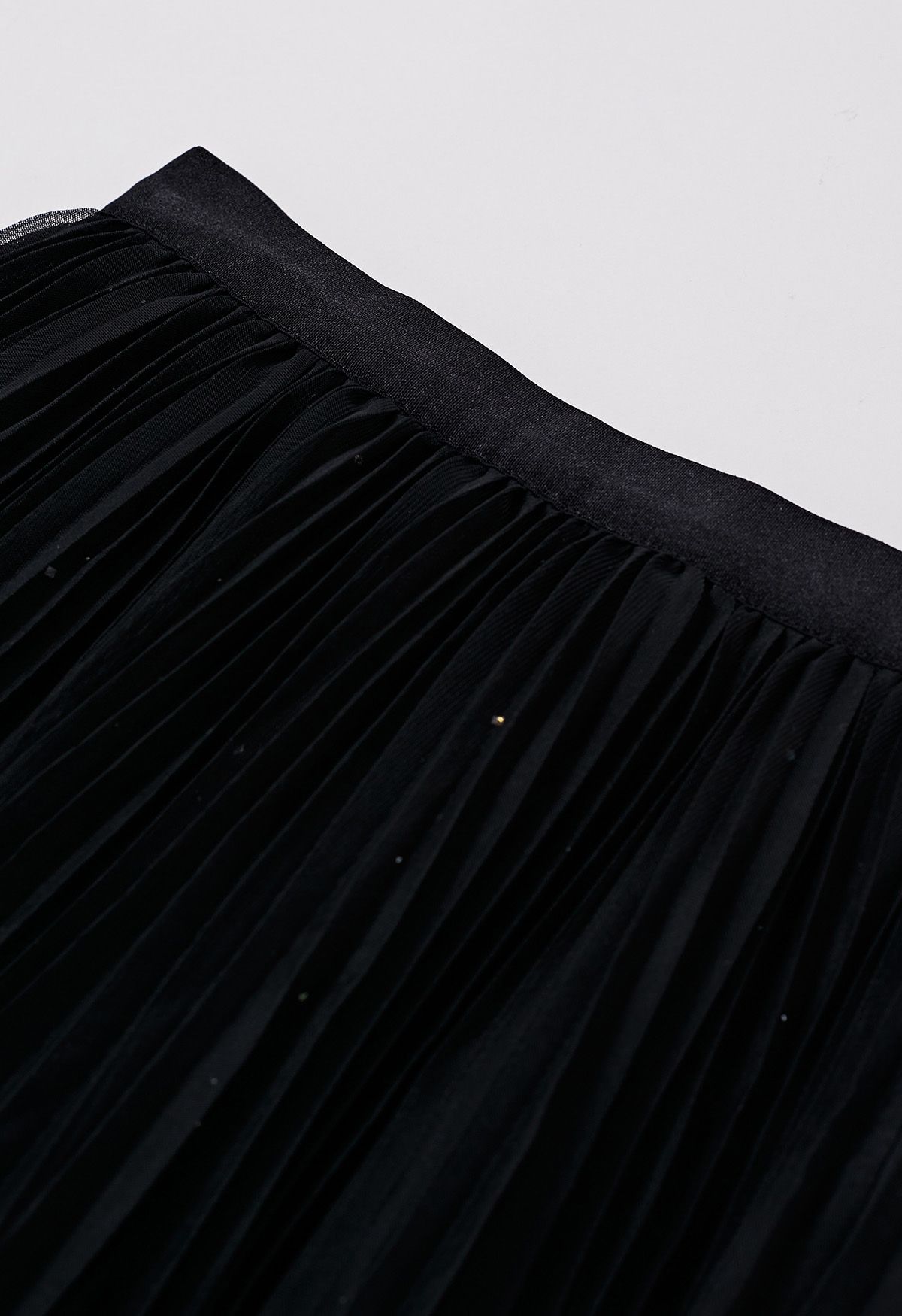 Jupe en tulle plissée à bordure scintillante en noir