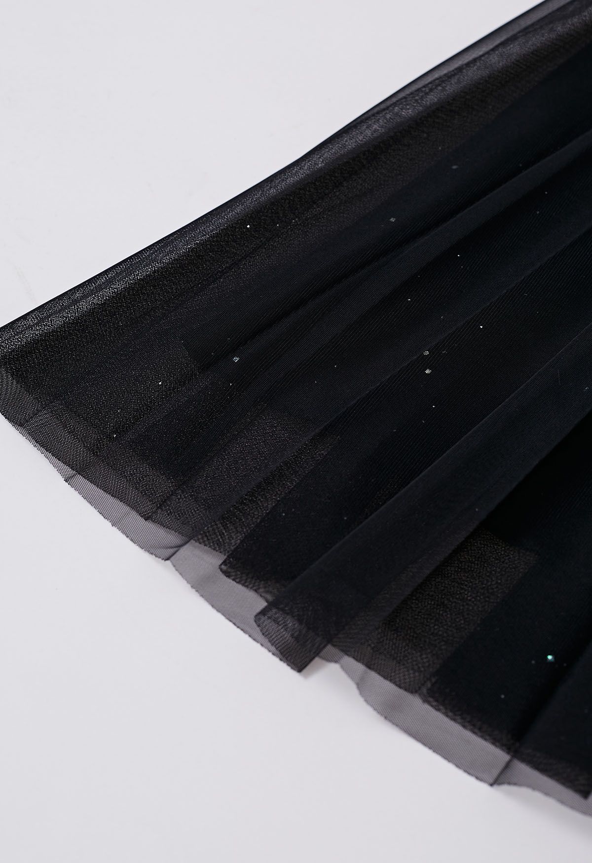 Jupe en tulle plissée à bordure scintillante en noir